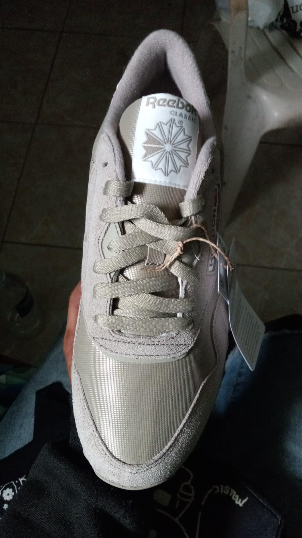 Reebok Classic sneakers worn with jeans showing real-world styling and casual fit