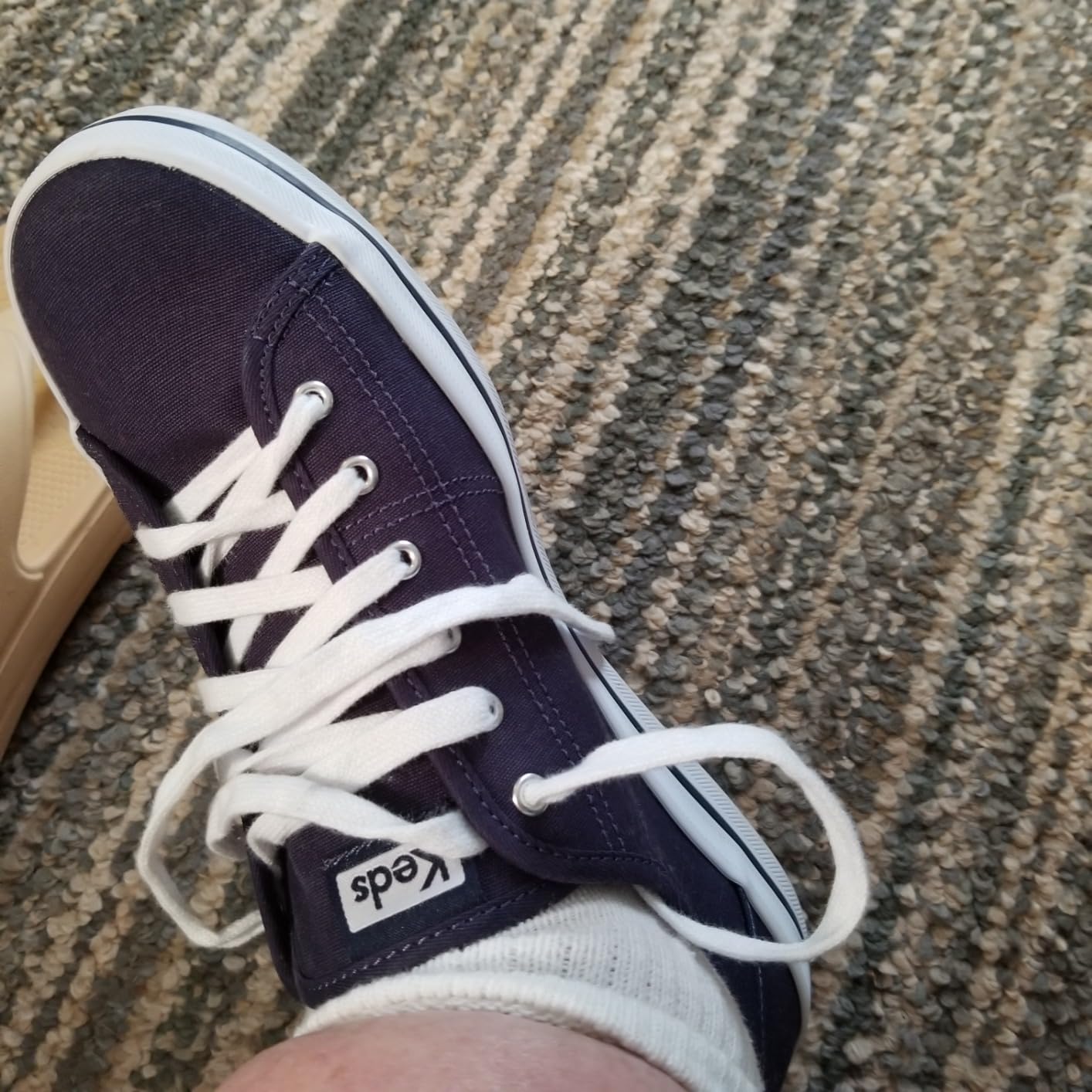 Final styling shot of Keds Kickstart showing complete look and practical application