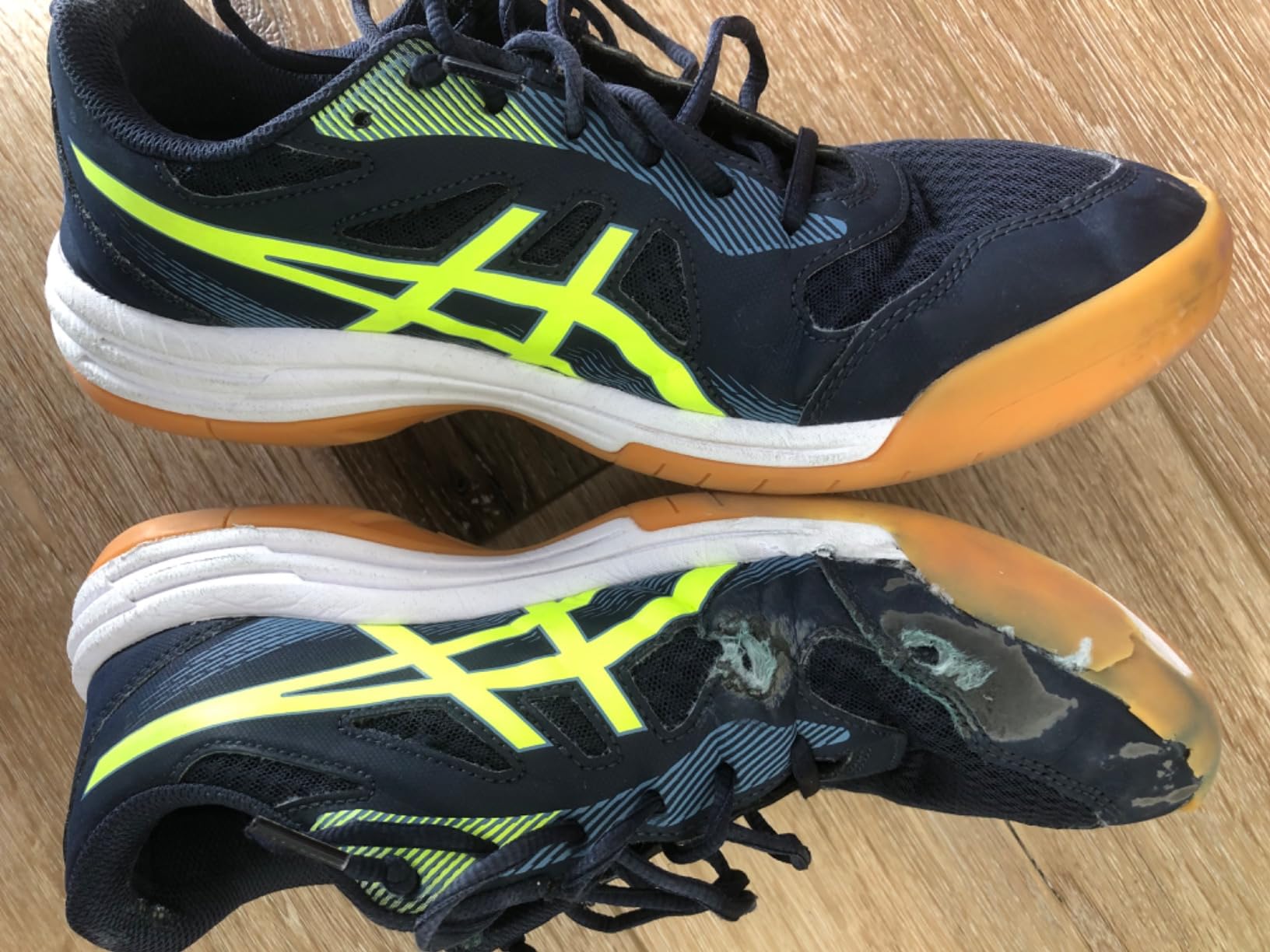 ASICS Men's Upcourt 5 volleyball shoes white safety yellow colorway showing mesh upper and gum rubber sole