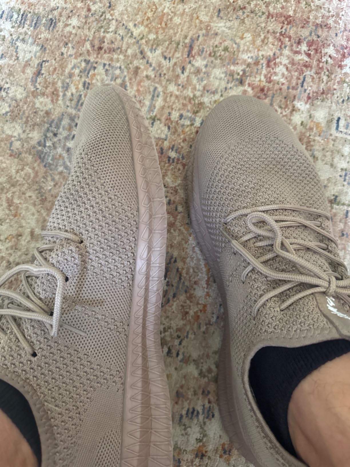 Side profile of FUJEAK shoe showing minimal heel-to-toe drop and cushioning profile