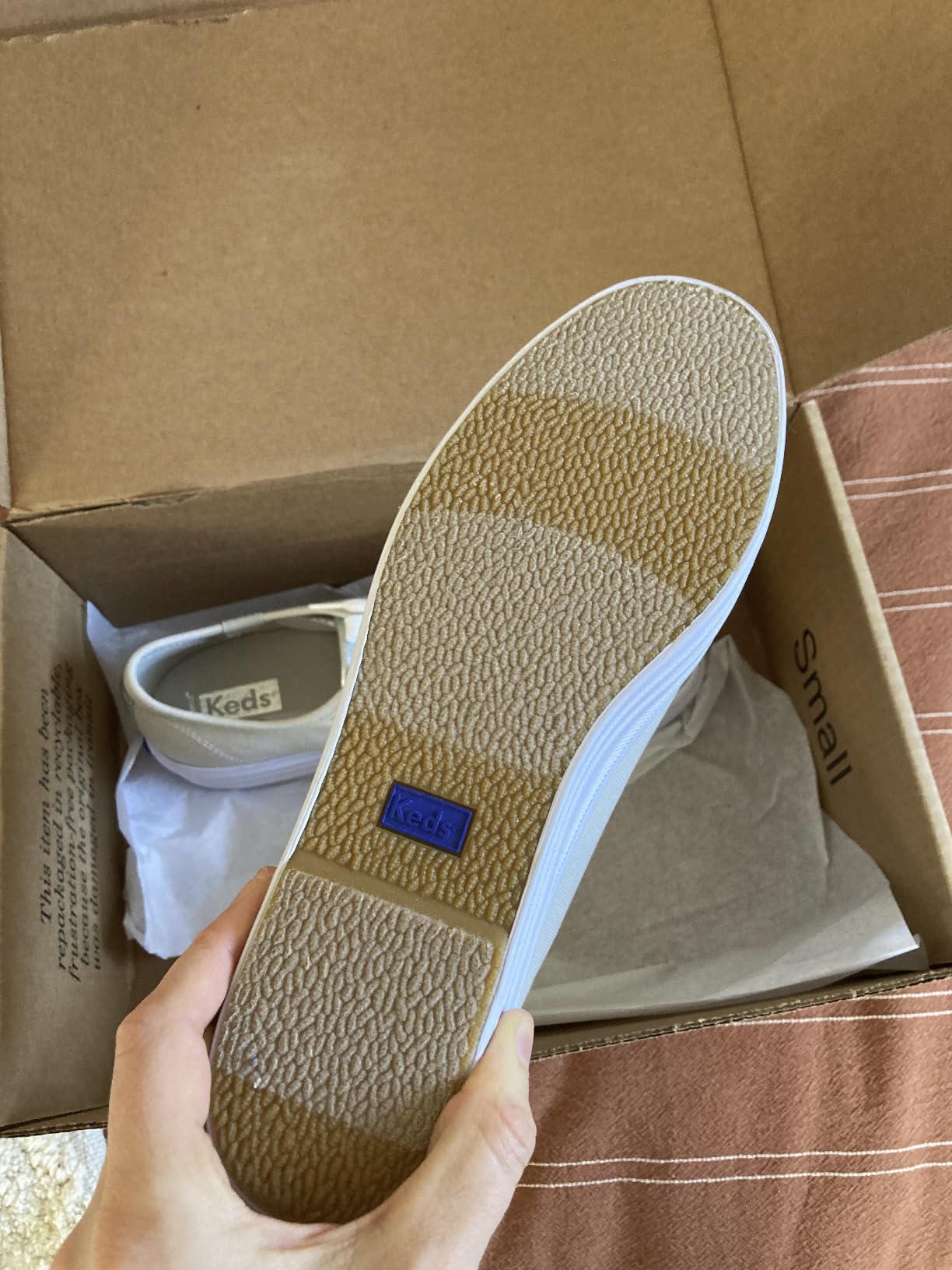 Side view of Keds Triple Up showing platform profile and leather construction details