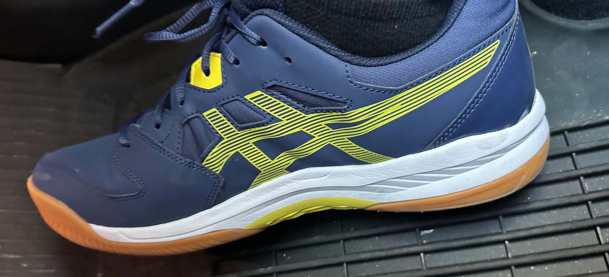 ASICS Gel-RENMA court shoes showing wrap-up outsole design and flex grooves
