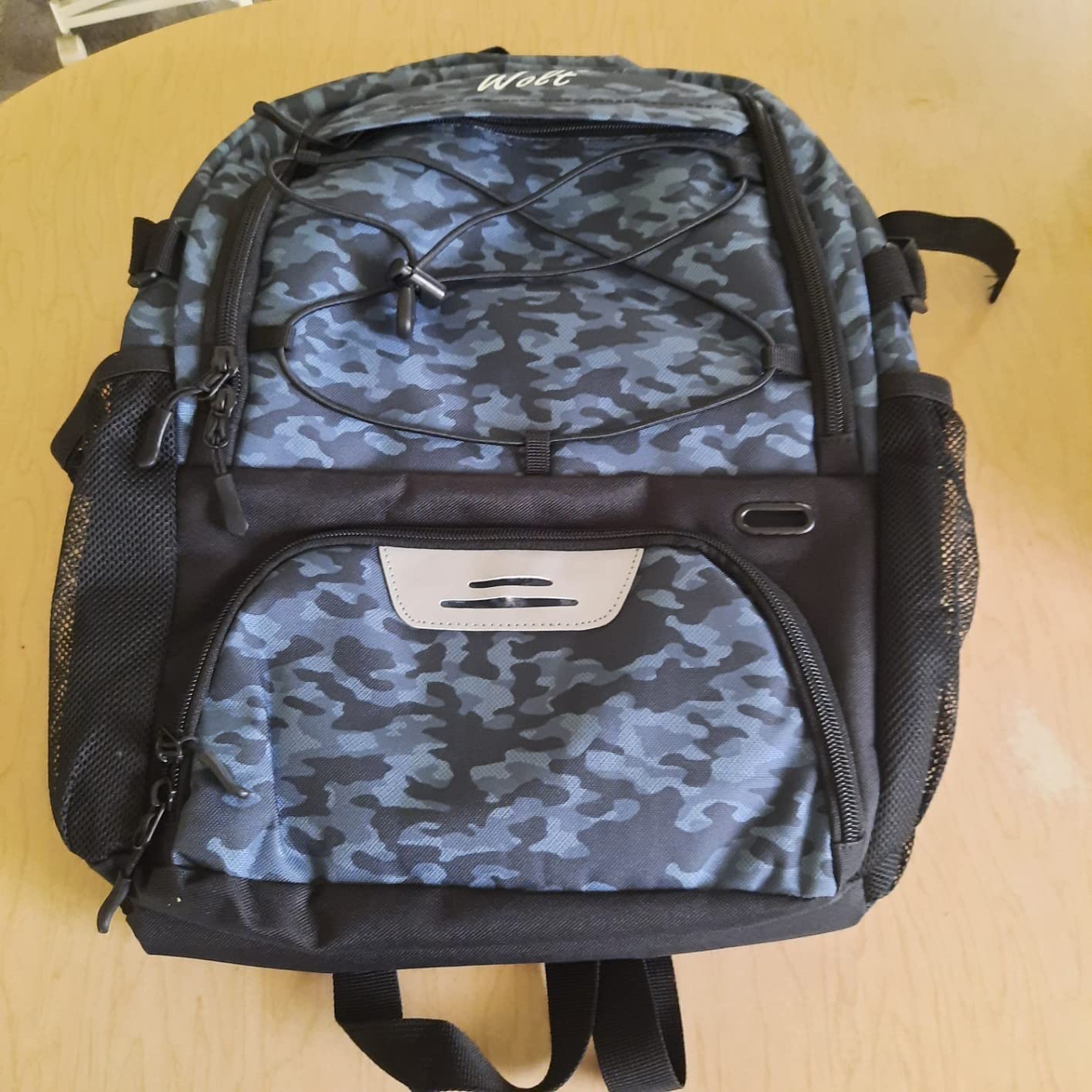 WOLT Basketball Backpack compartment organization showing ball and shoe storage areas