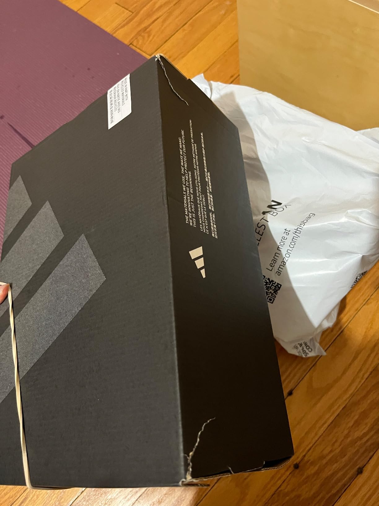 Adidas Gamecourt 2 product packaging showing tennis shoe marketing claims