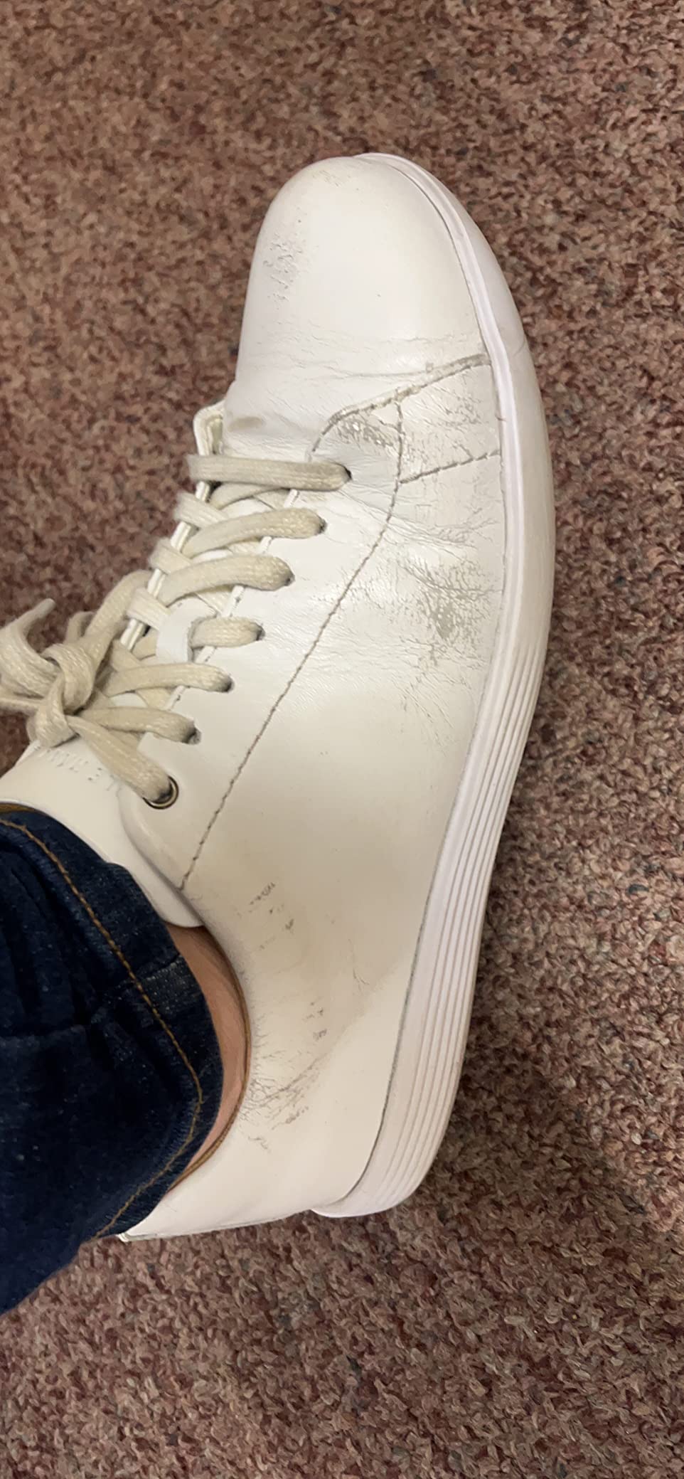 Durability issues showing white coating peeling off after several months of use