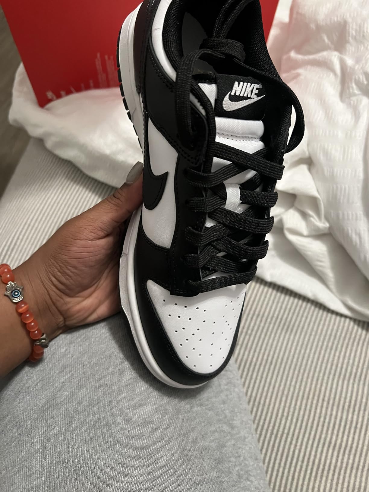 Nike Dunk Low authentic features showing Nike branding and quality construction details