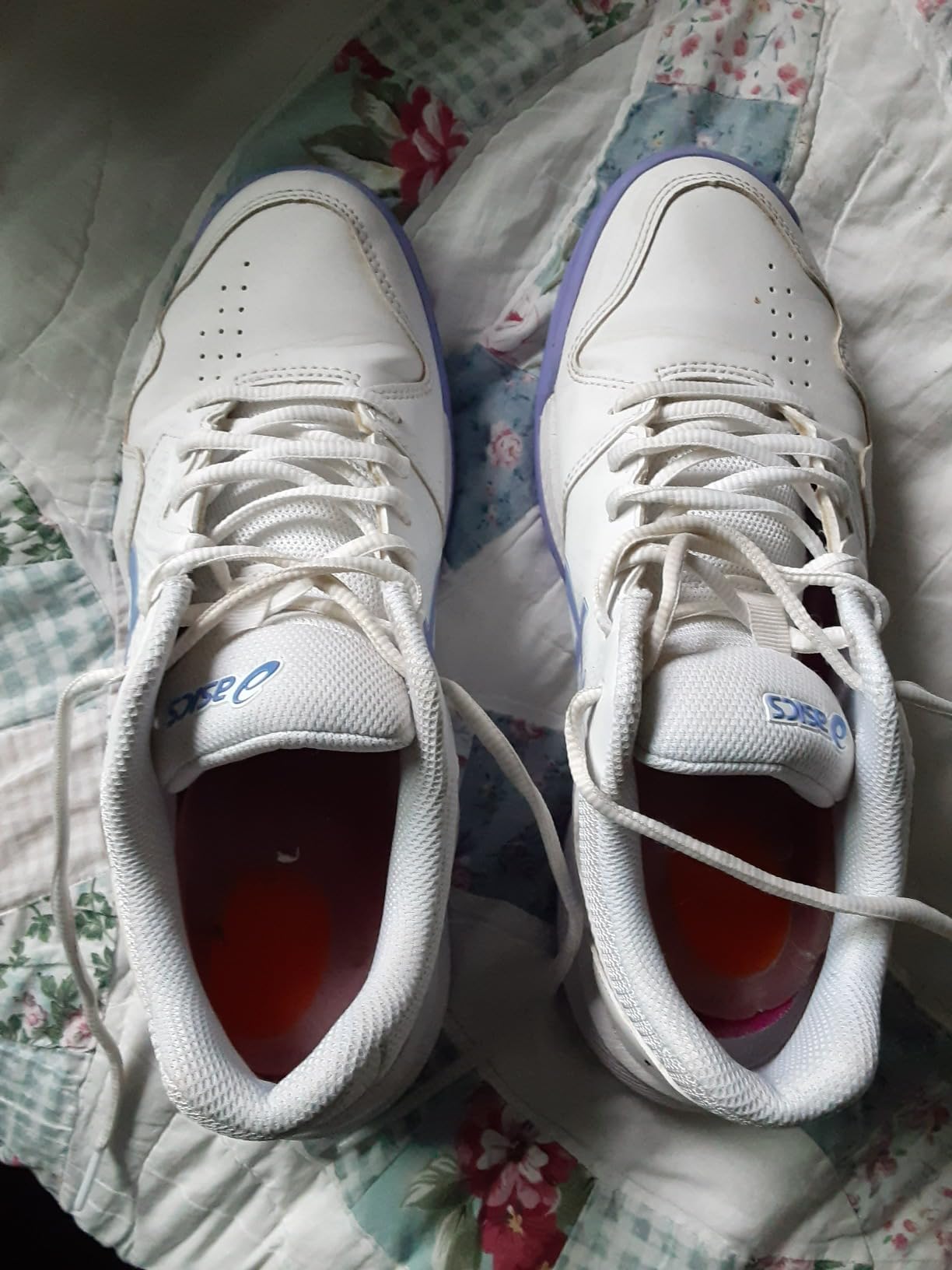 ASICS Women's Gel-Dedicate 7 tennis shoes showing white and blue colorway design