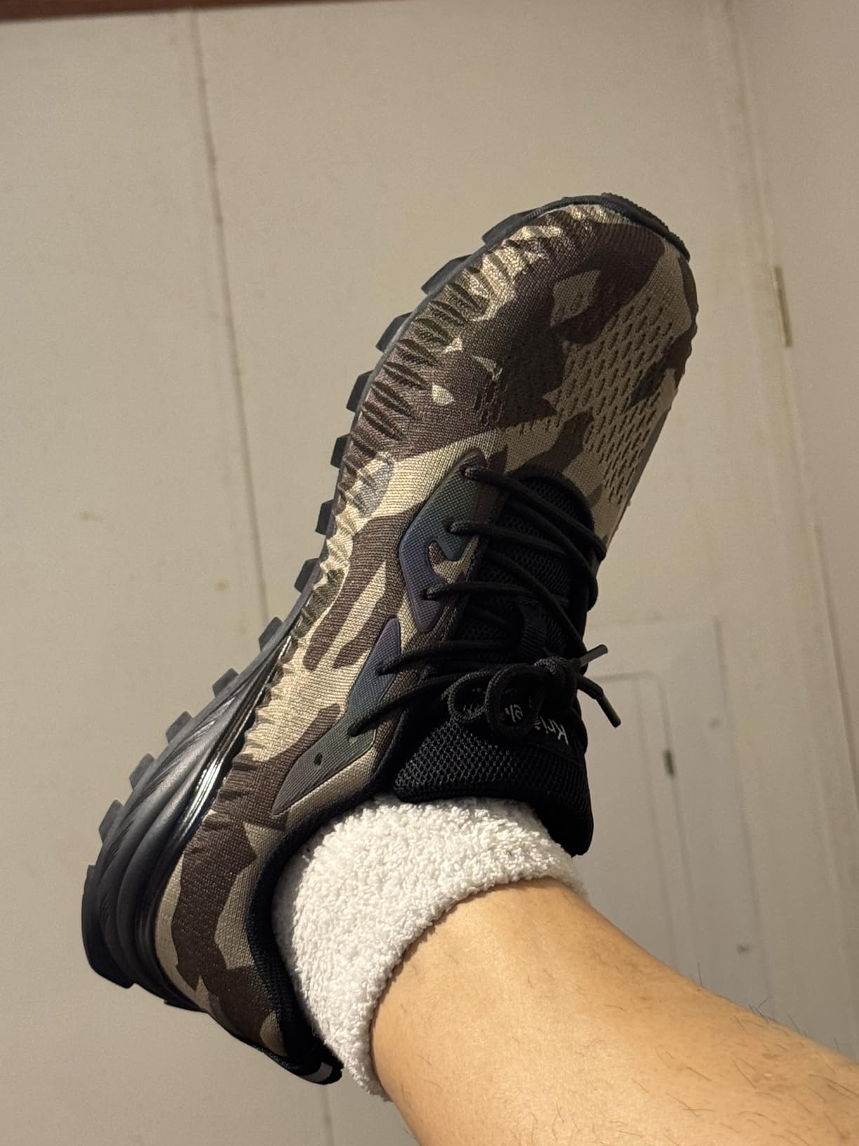Detailed view of EVA midsole with air pocket design and heel counter construction