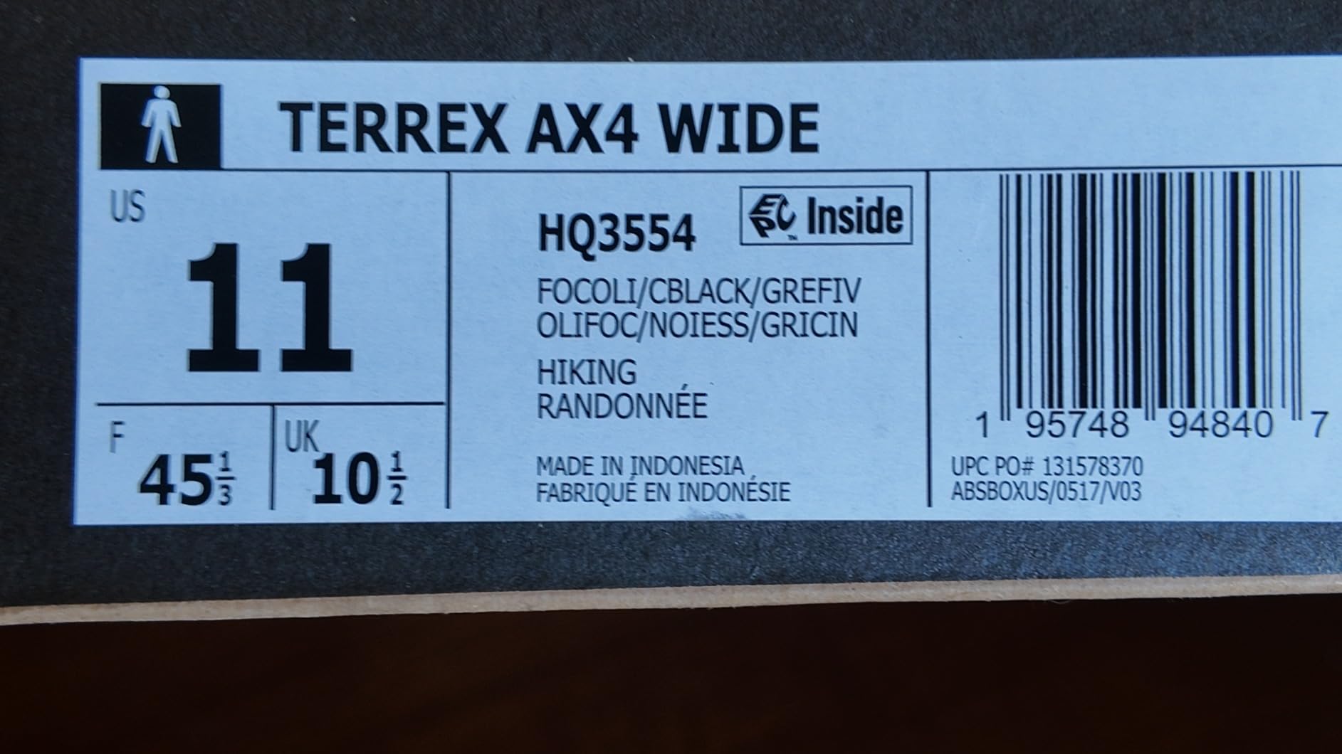 Adidas Terrex AX4 in action on rocky trail terrain showing real-world performance