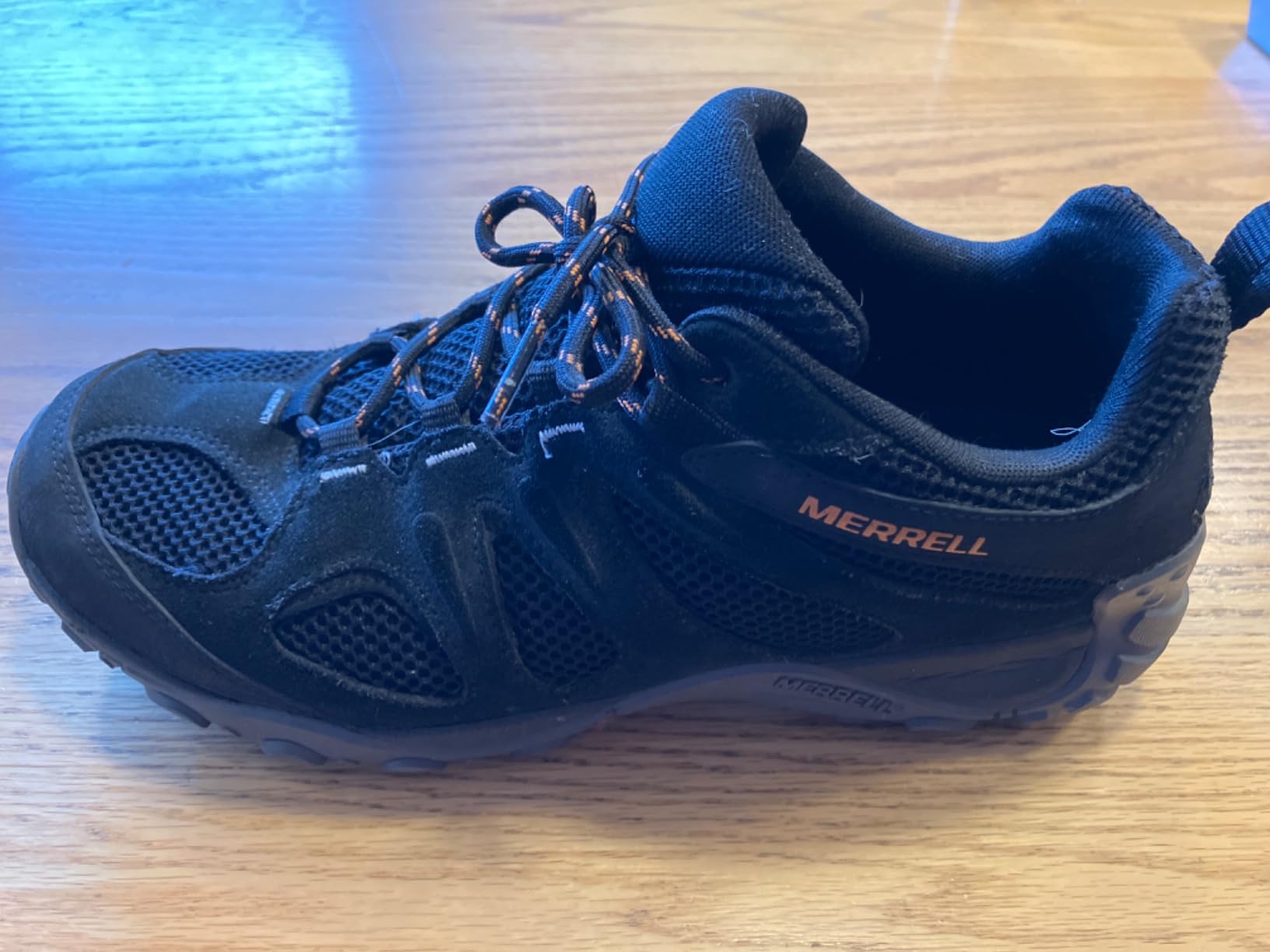 Merrell Yokota 2 side profile showing ankle height and overall silhouette for hiking use