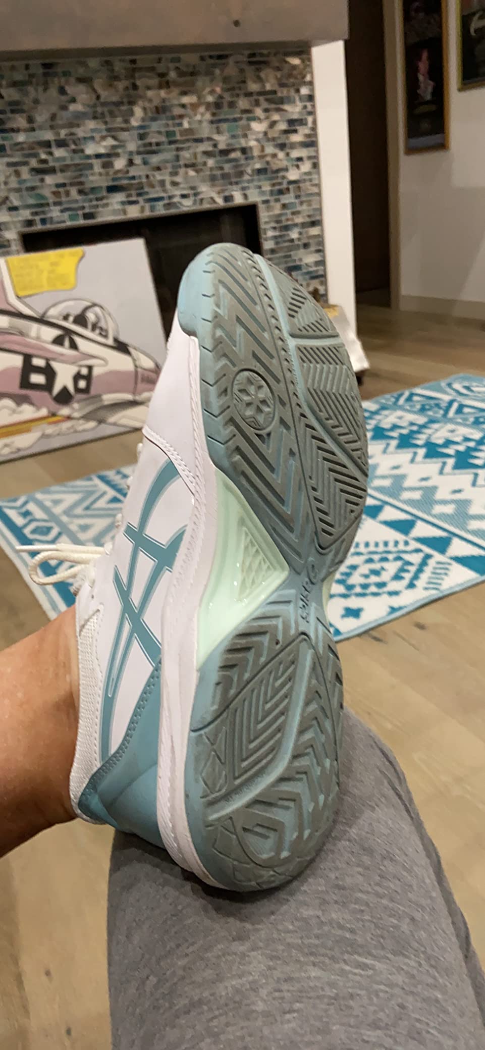 ASICS Gel-Dedicate 7 in action on tennis court showing real-world usage scenario