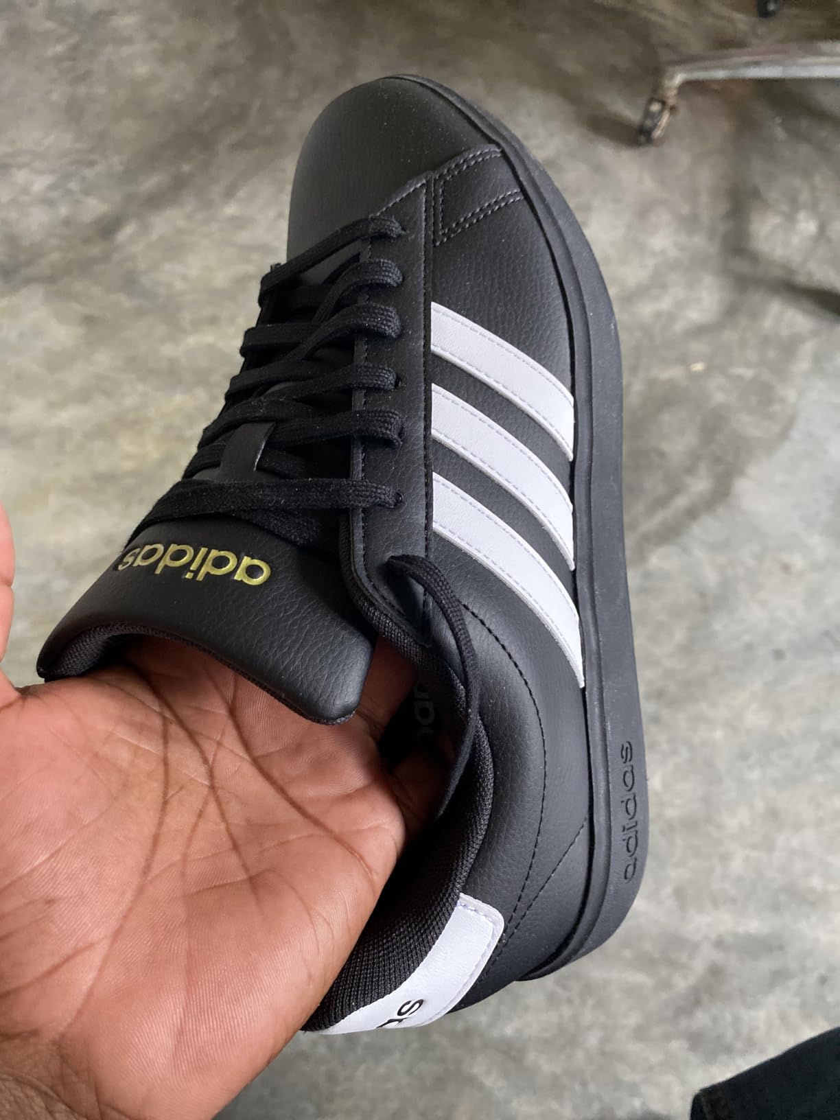 Adidas Grand Court 2.0 in outdoor casual setting demonstrating all-day comfort and style