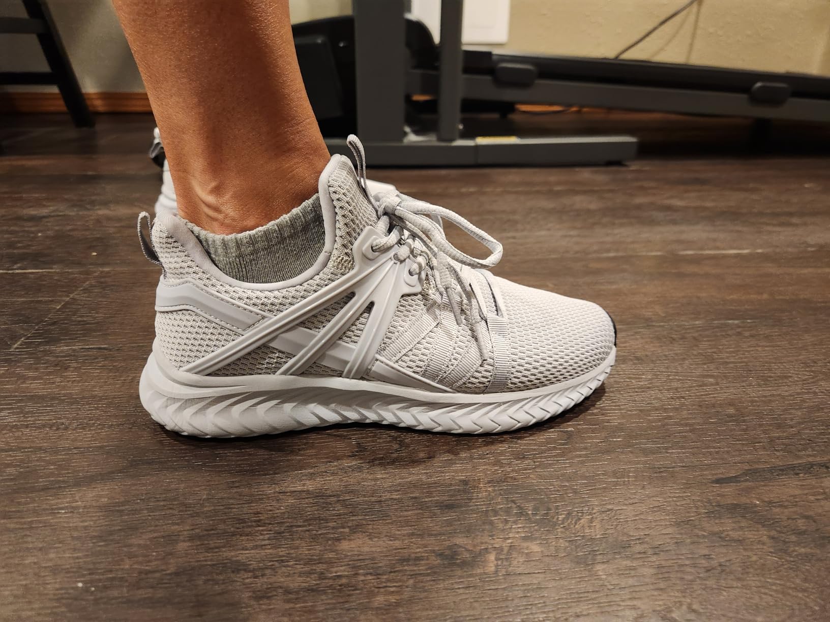 Side profile of Abboos women's sneakers demonstrating the slip-on design and heel protection