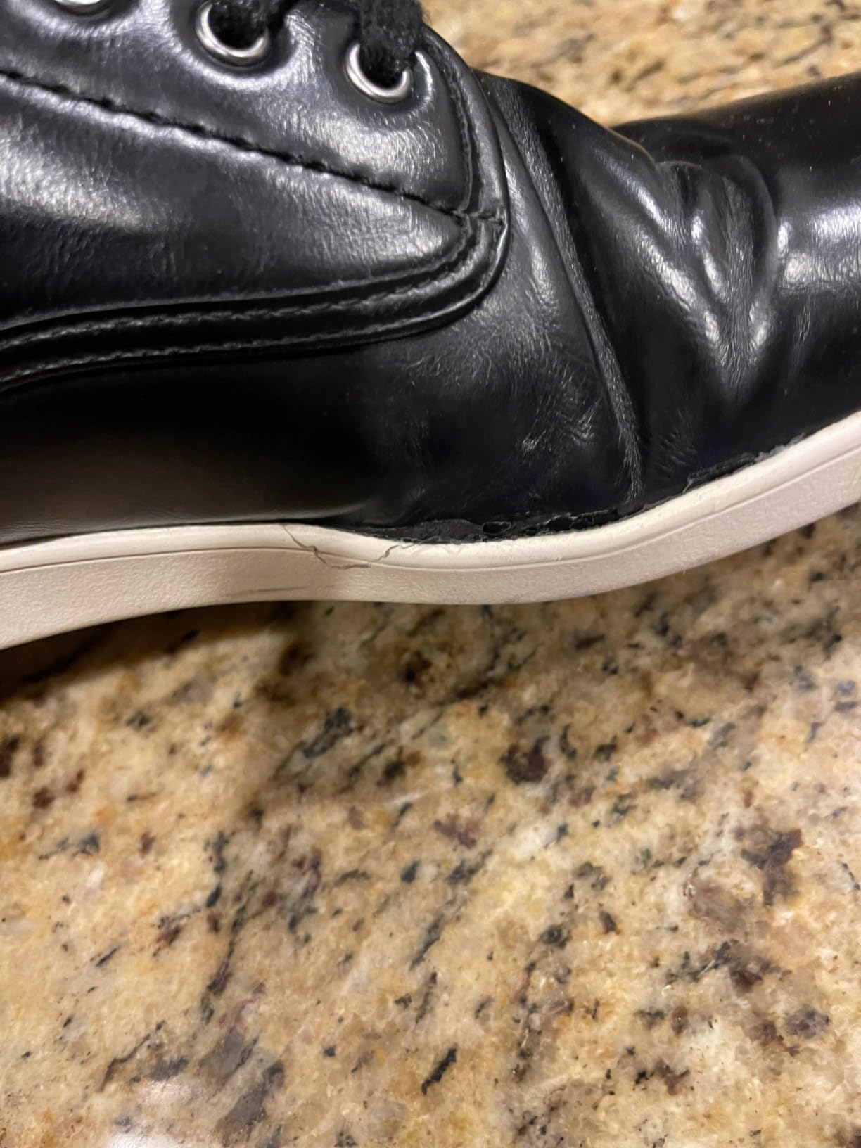 Sole starting to separate from upper after light office rotation on Steve Madden Fenta