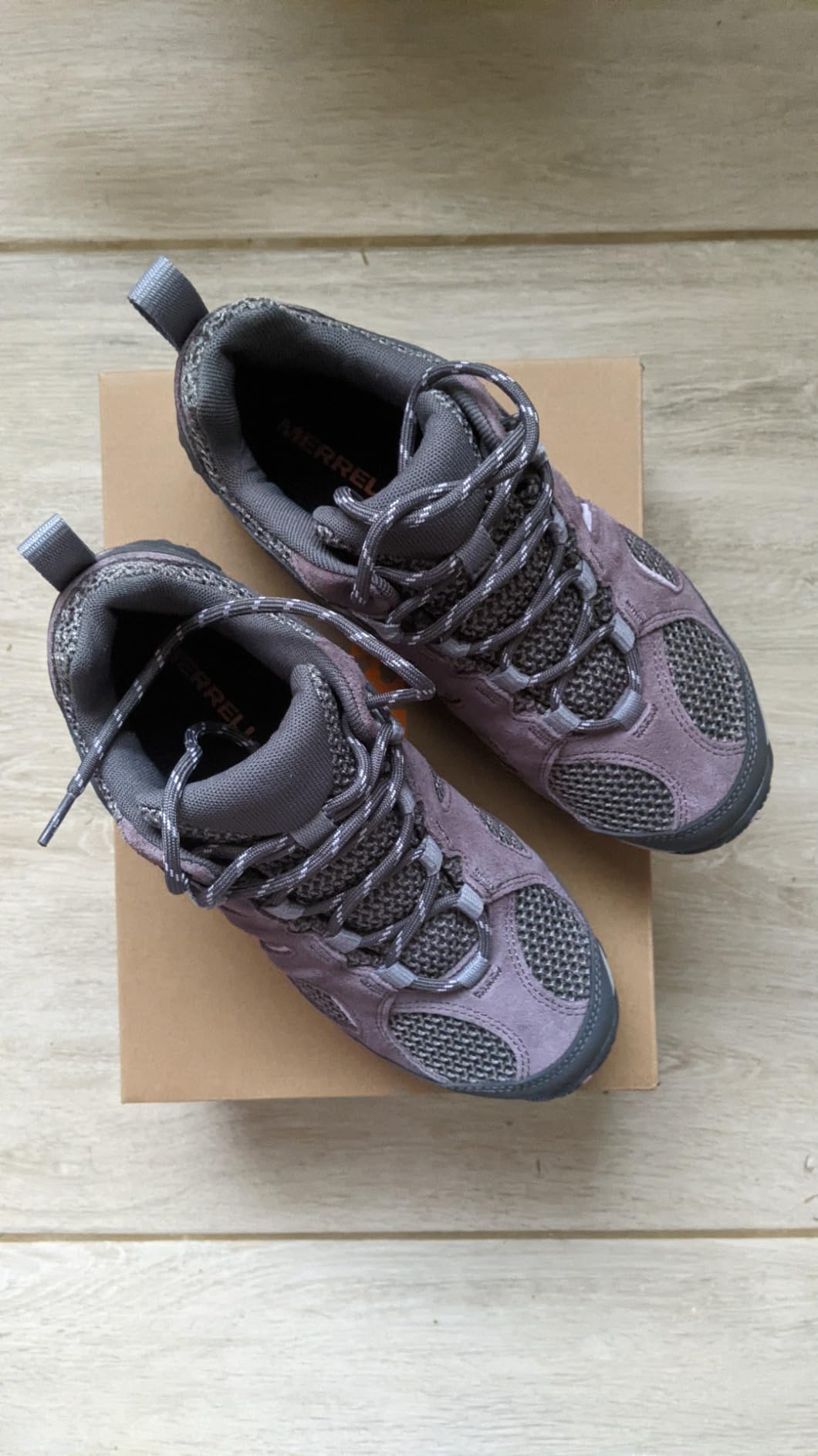 Merrell Yokota 2 in wet trail conditions showing water resistance capabilities