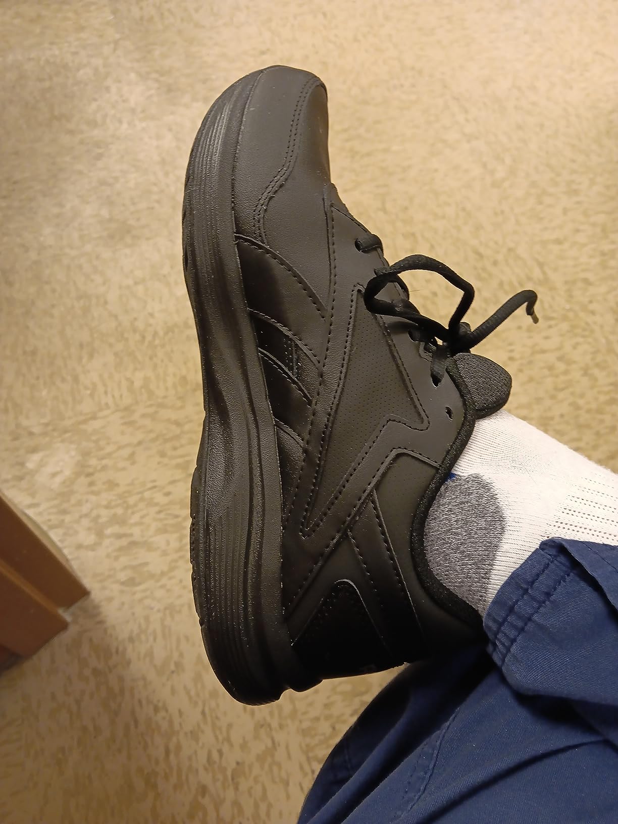 Multiple Reebok DMX walking shoes showing different stages of wear and long-term usage