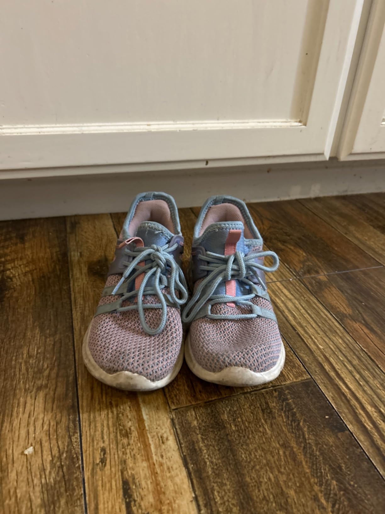 RUNSIDE Kids Tennis Shoes showing anti-collision toe design and sole grip pattern