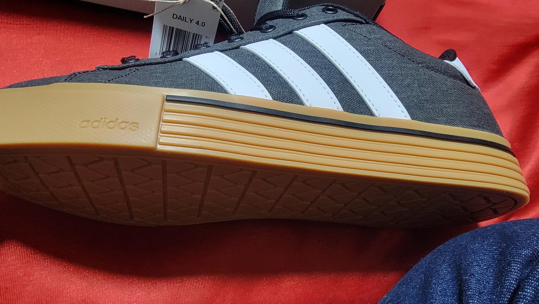 Bottom sole view of Adidas Daily 4.0 showing rubber outsole tread pattern