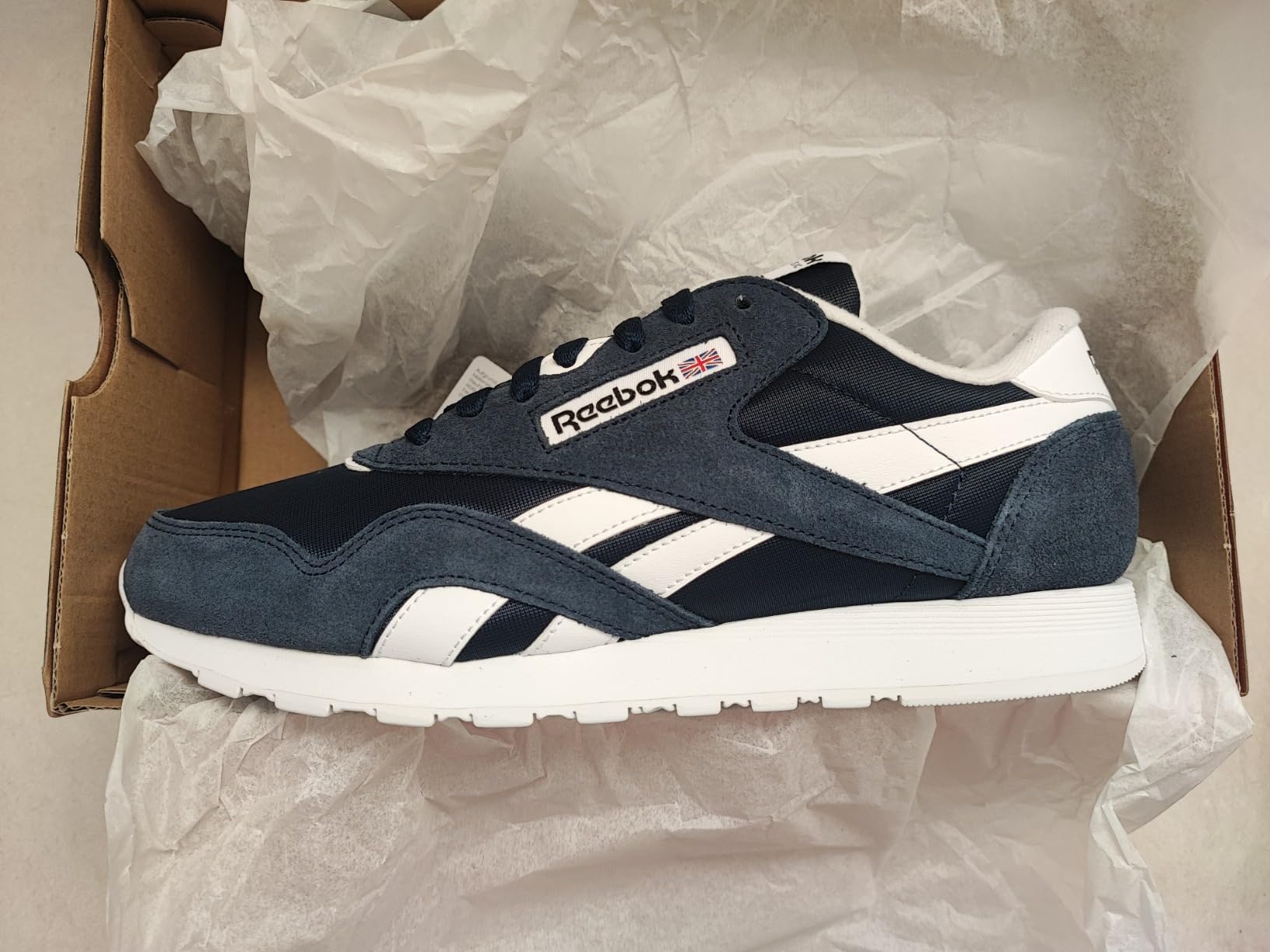 Blue colorway Reebok Classic sneakers showing alternative color option and material finish