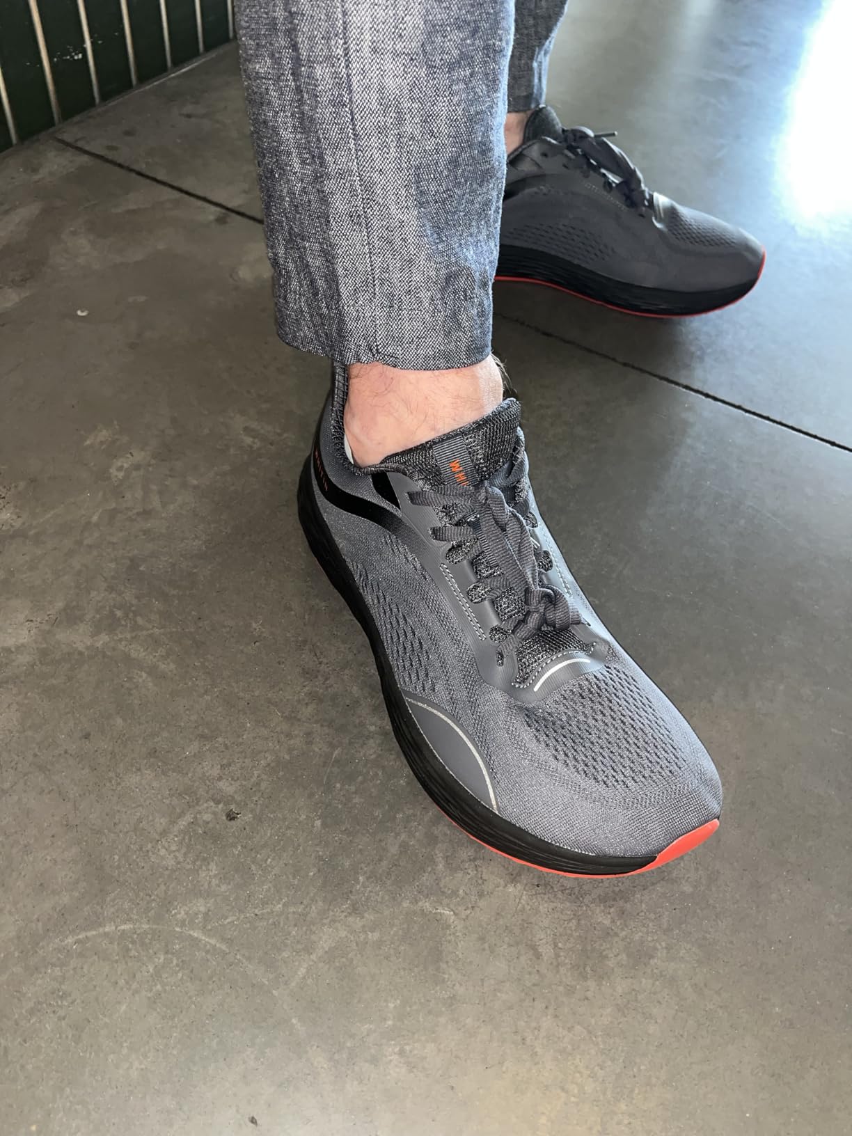 WHITIN running shoes in outdoor setting showing versatility for various activities