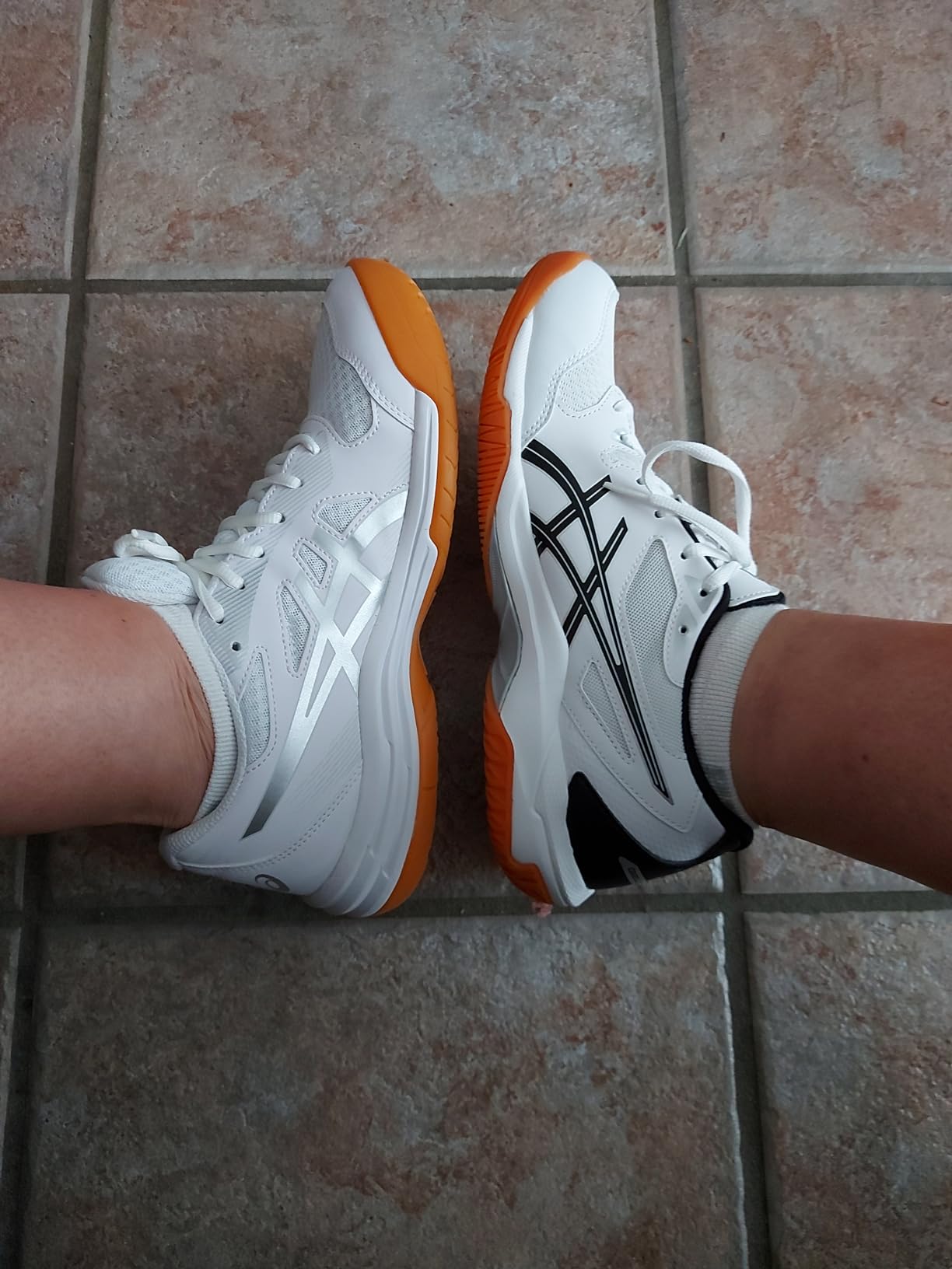 ASICS Upcourt 5 compared to other court shoes showing design differences