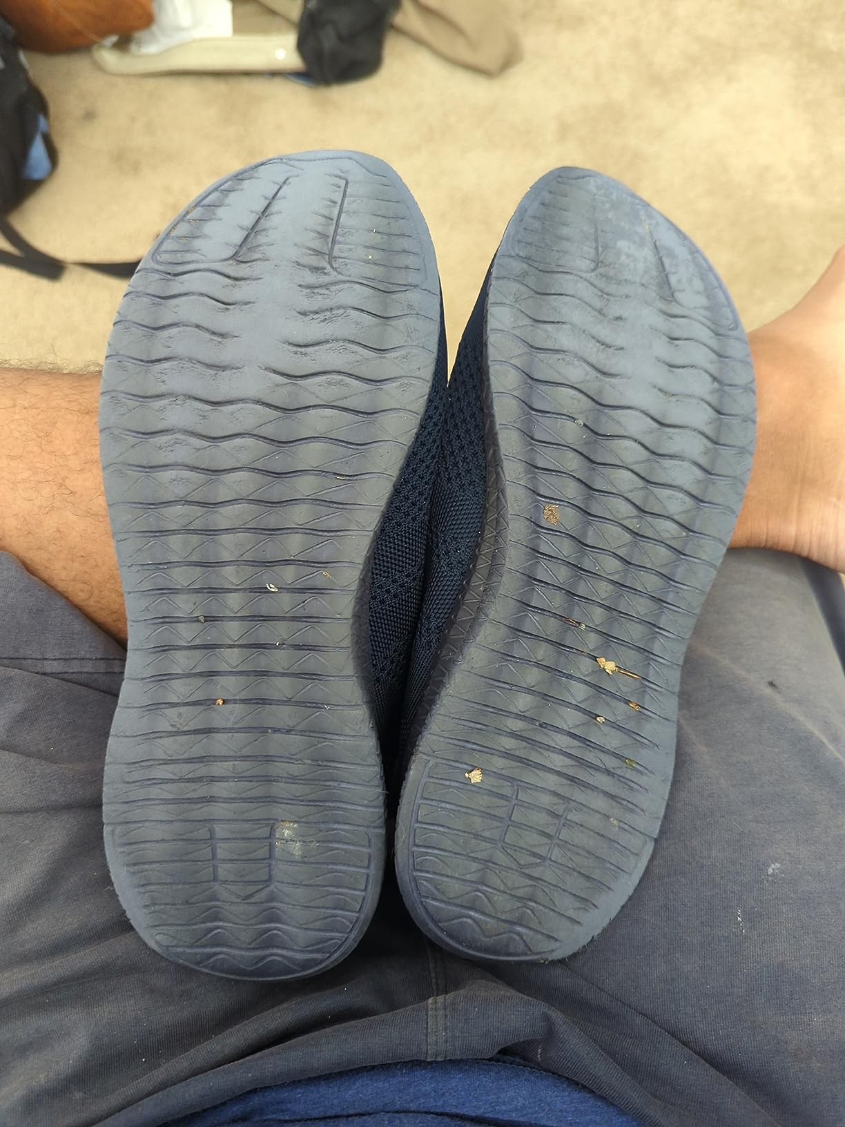FUJEAK shoes after 100 miles of wear showing sole wear pattern and durability