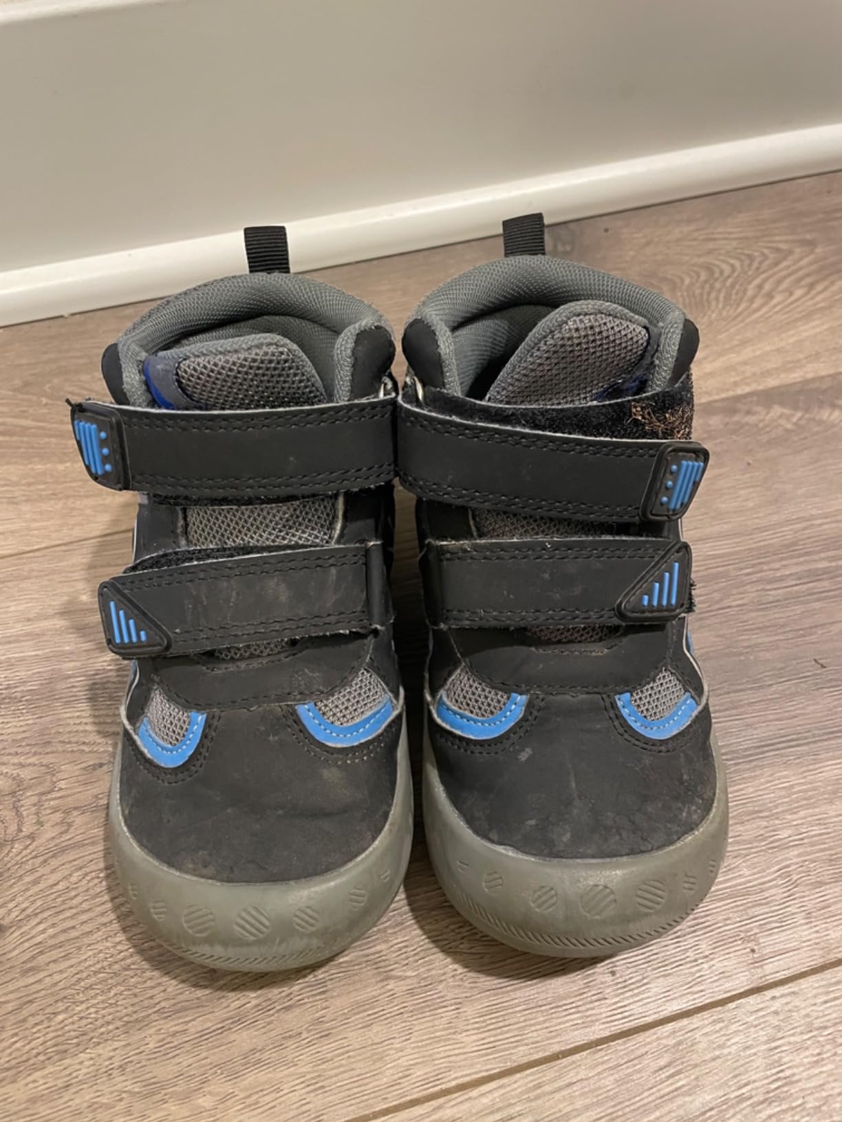 Side profile of Mishansha kids hiking boots displaying the water resistant upper material and ankle support design