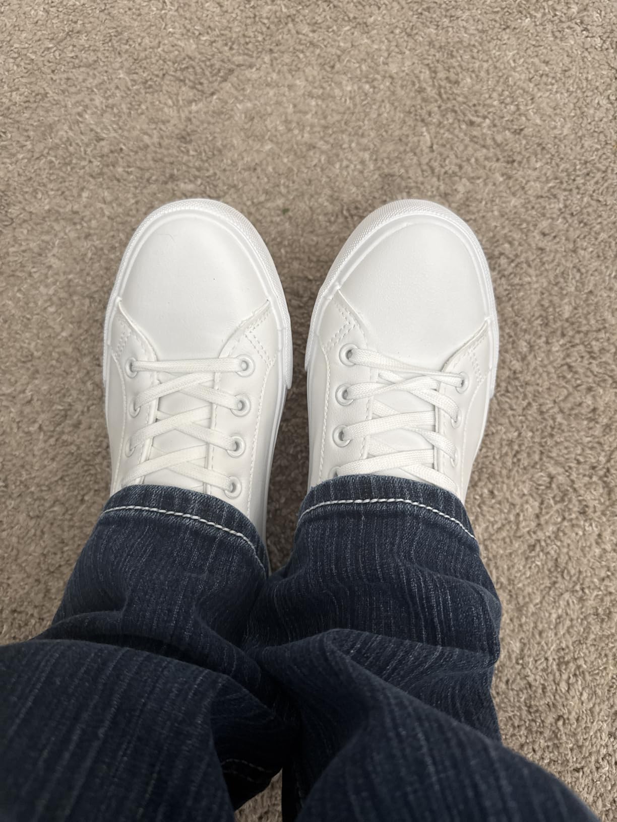 SERNIAL white sneakers styled with casual outfit showing versatility and clean appearance
