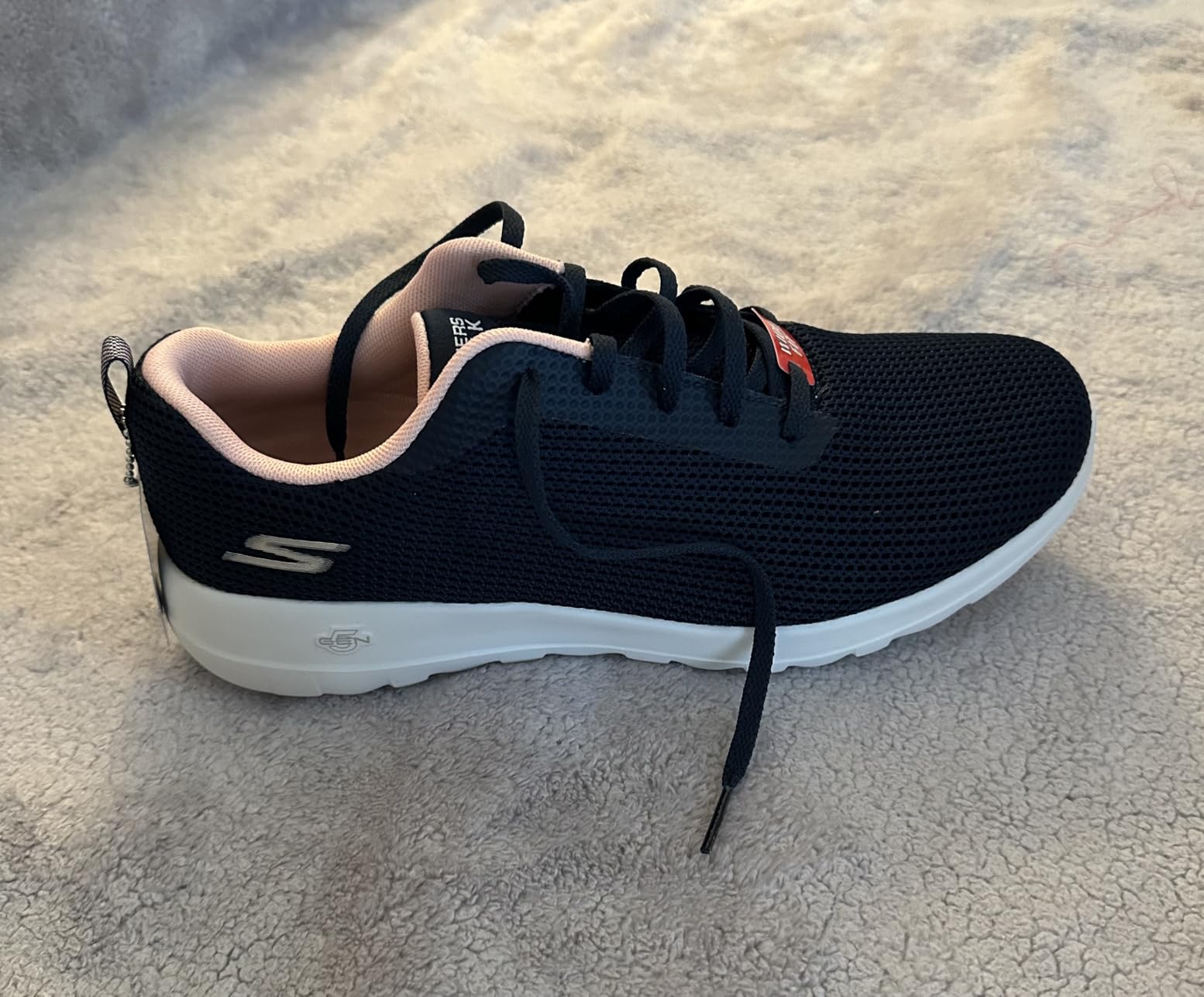 Skechers Go Walk Joy Upturn side profile showing mesh upper and sole design