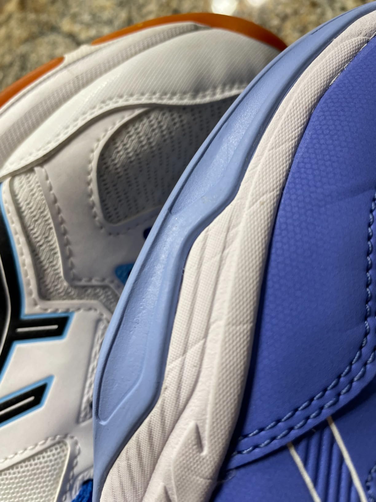 Asics Gel-RENMA showing synthetic leather overlays and court shoe construction details