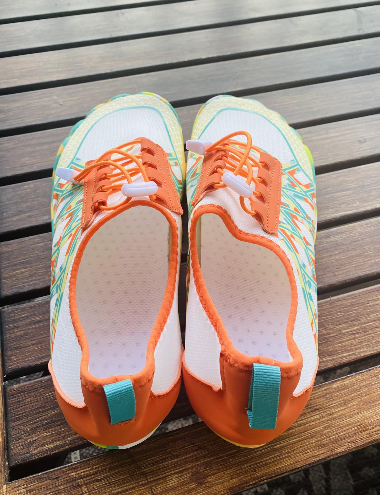 Side view showing flexible design and smooth neck construction to prevent chafing