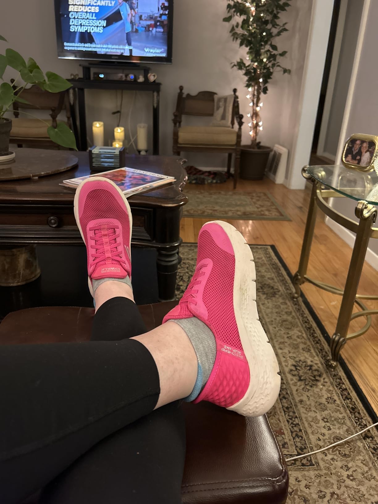 Bright pink Skechers Go Walk Flex showing colorway variety and heel pillow design detail
