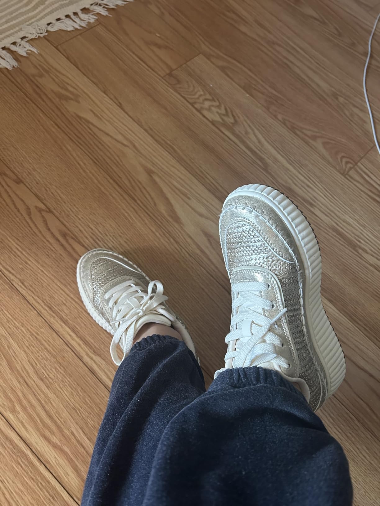 Gold-arch colorway highlighting subtle metallic finish