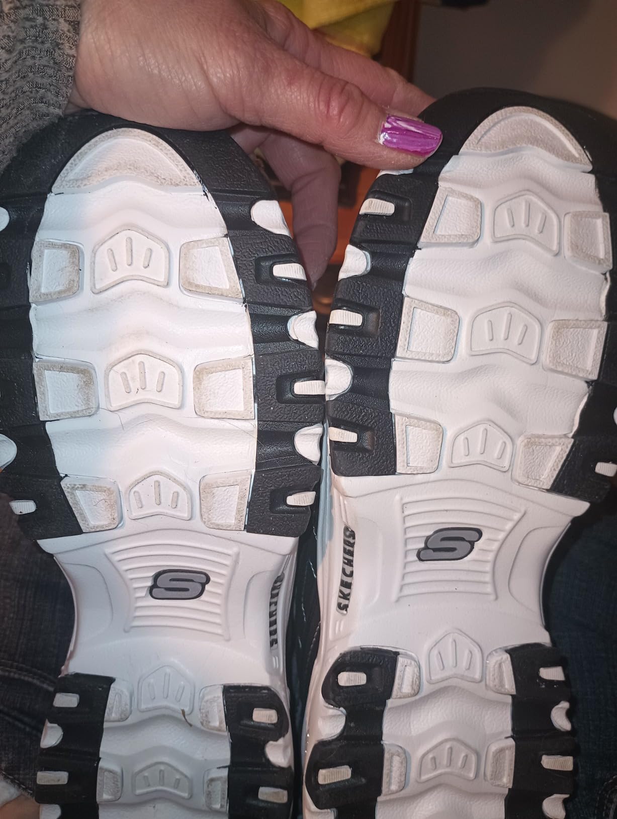 Skechers D'Lites sole showing thick rubber outsole pattern and memory foam comfort technology