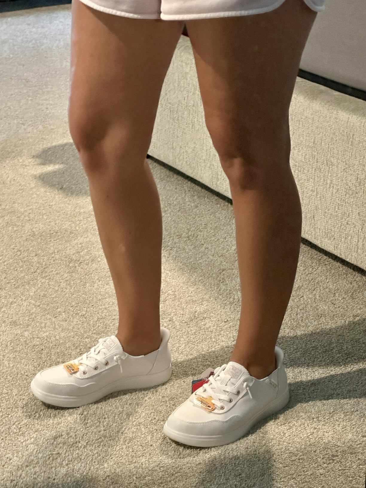 Skechers Skip Cute sneakers being worn showing versatility with casual outfit