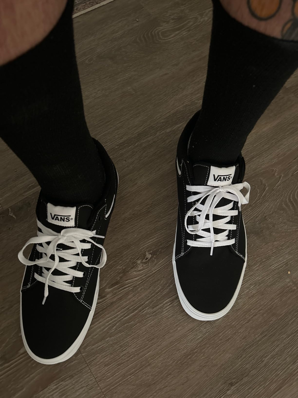 Vans Seldan sneaker on foot showing low-profile court style and clean leather finish