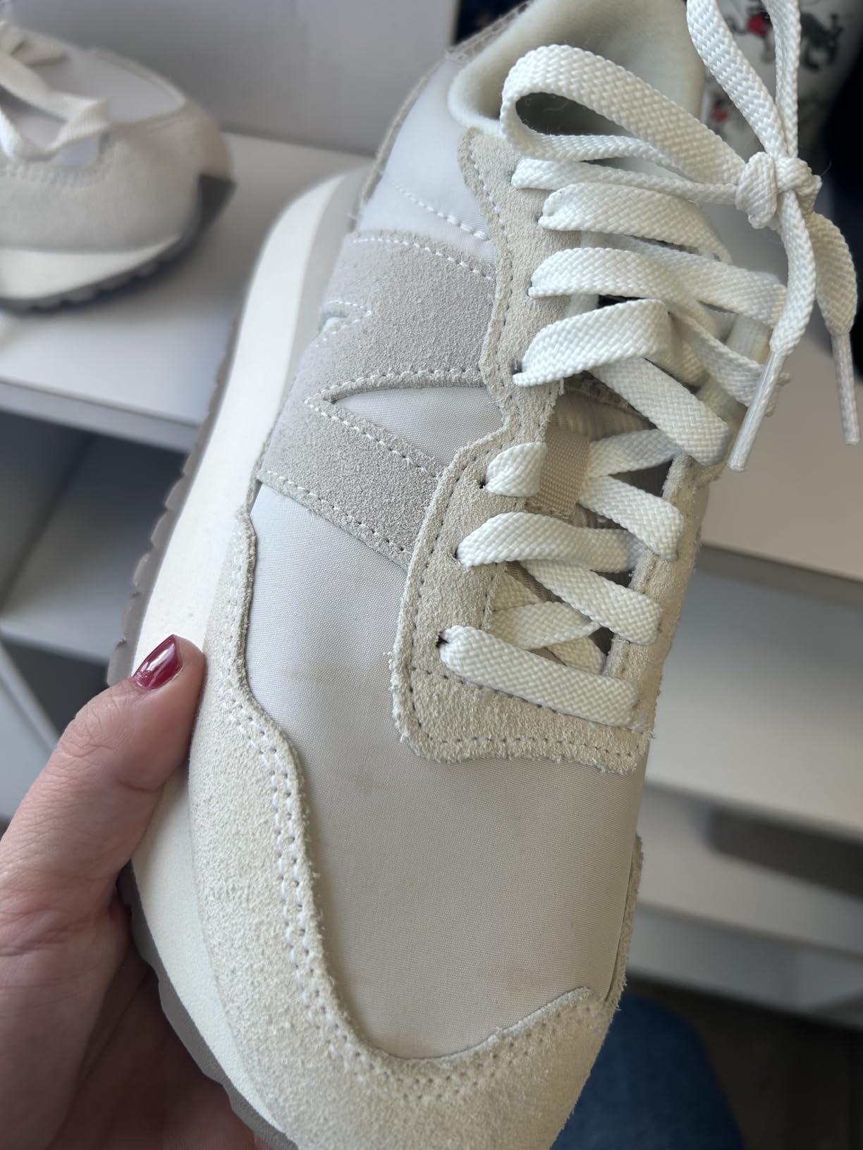 New Balance 237 quality control issue showing stained shoe received by customer
