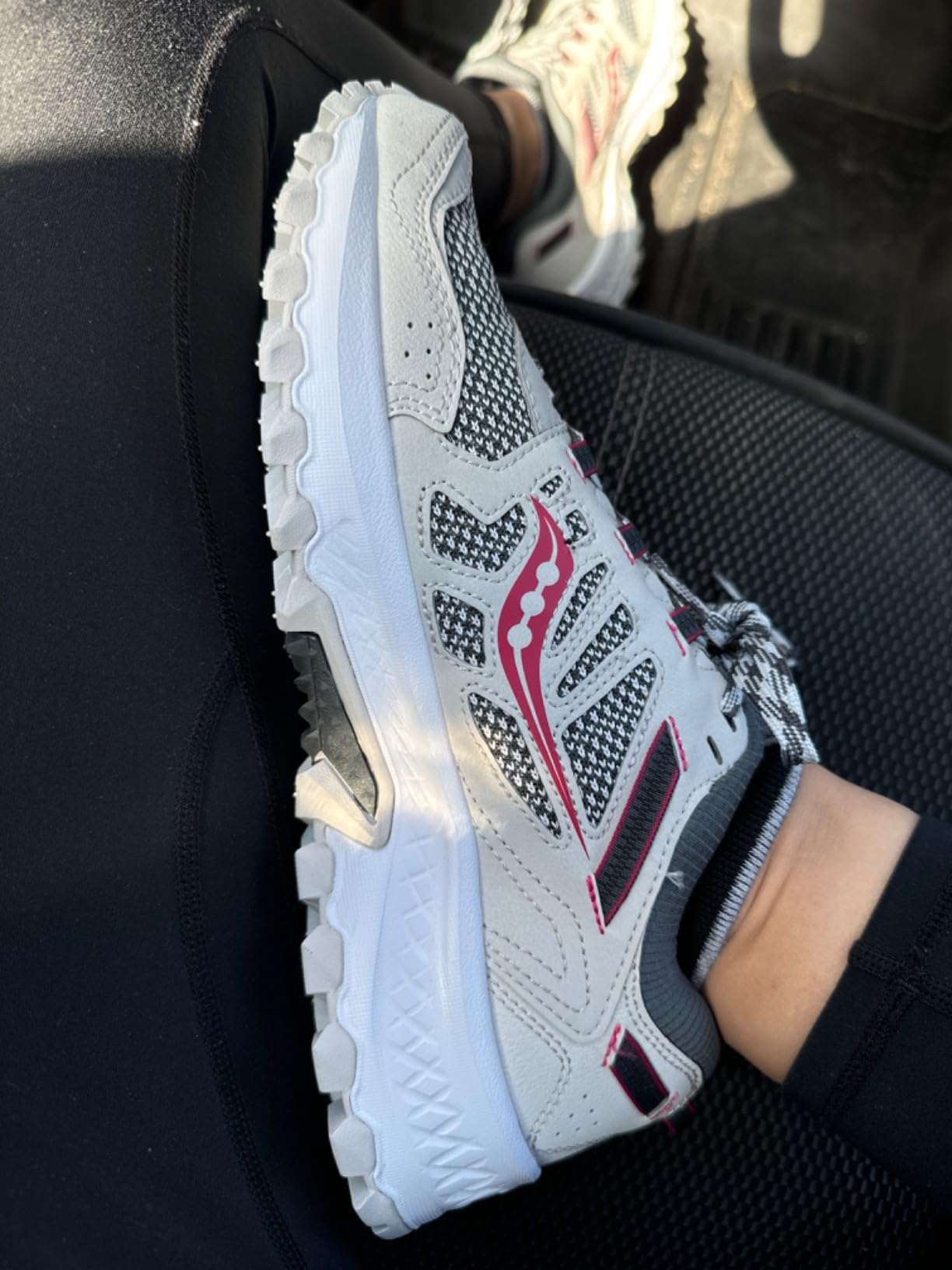 Side profile of Saucony TR13 showing midsole thickness and heel-to-toe transition design