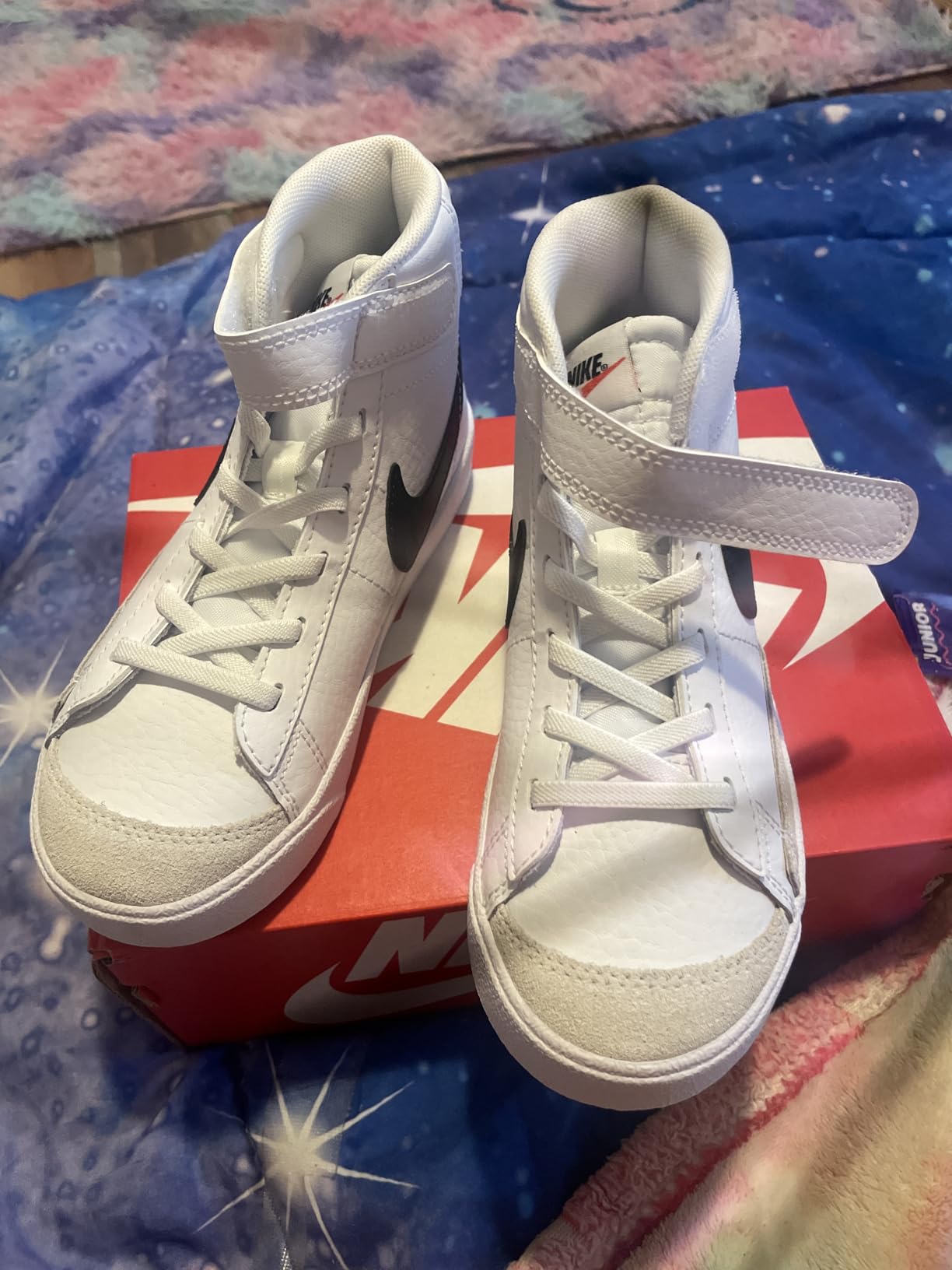 Close up detail of Nike Kids Blazer Mid 77 showing leather upper construction and Nike swoosh