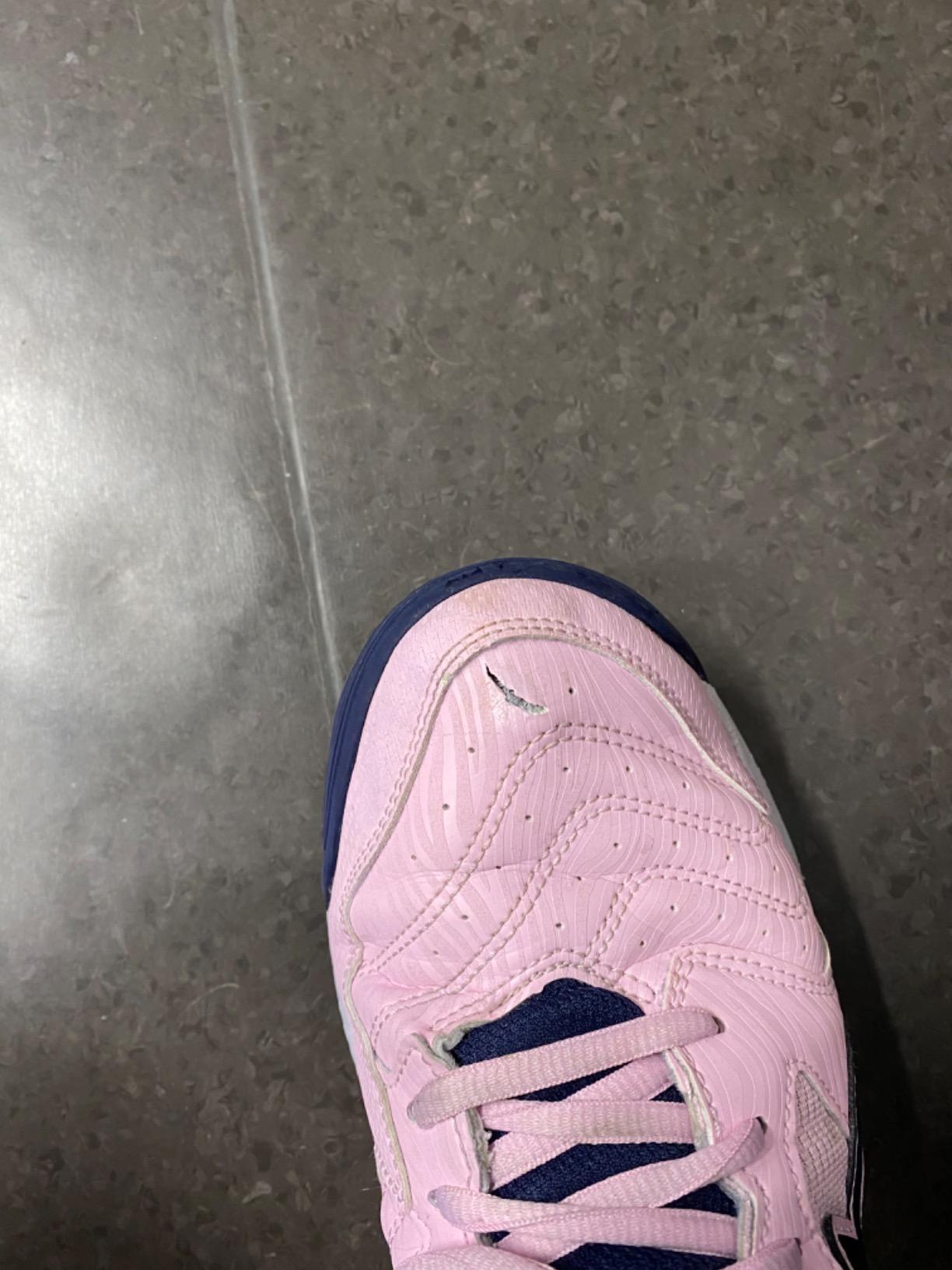 Side angle showing ASICS Gel-Dedicate 6 profile with GEL cushioning technology and court-specific sole pattern