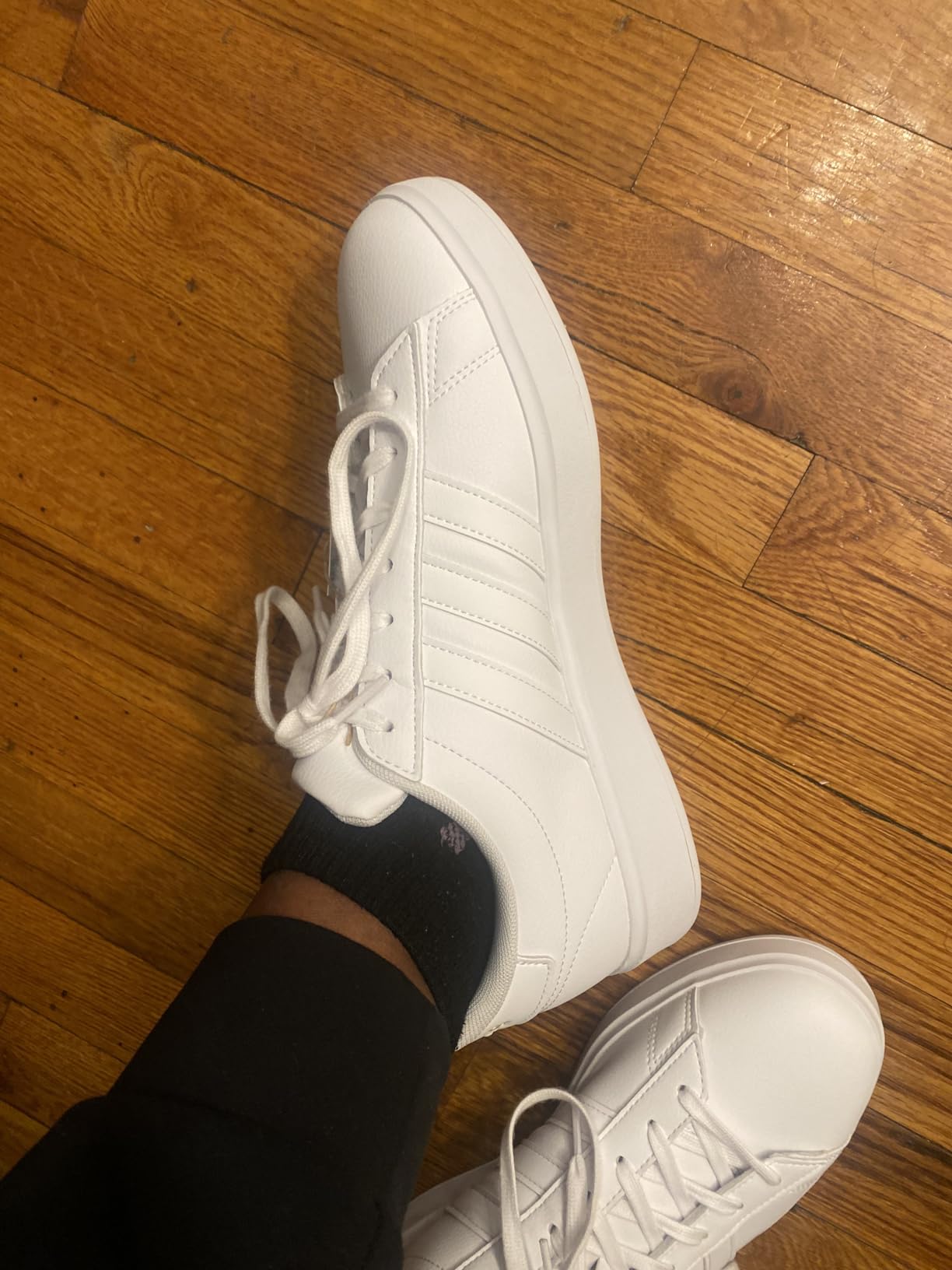 Multiple angles of Adidas Grand Court 2.0 showing overall design and construction quality