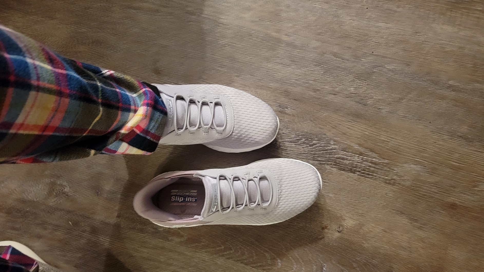 Different colorways of Skechers slip-ins showing variety of style options available
