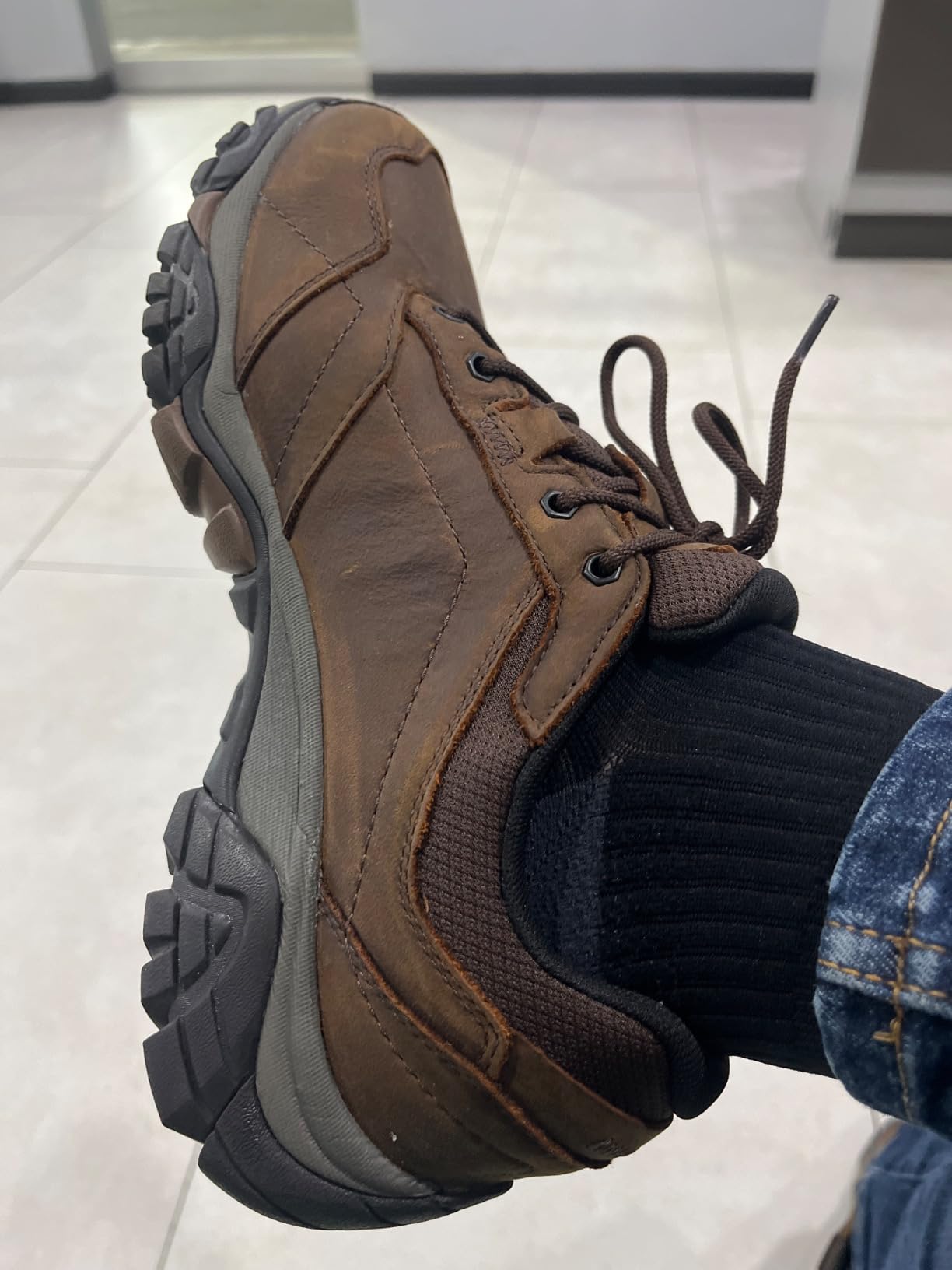 Merrell Adventure Lace men's hiking shoe showing nubuck leather upper and Vibram sole construction