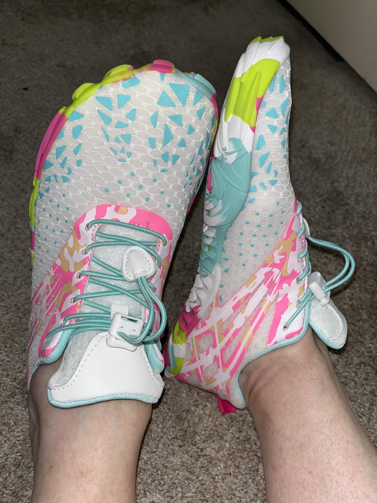 Scurtain unisex water shoes showing breathable mesh upper and secure bungee lacing system