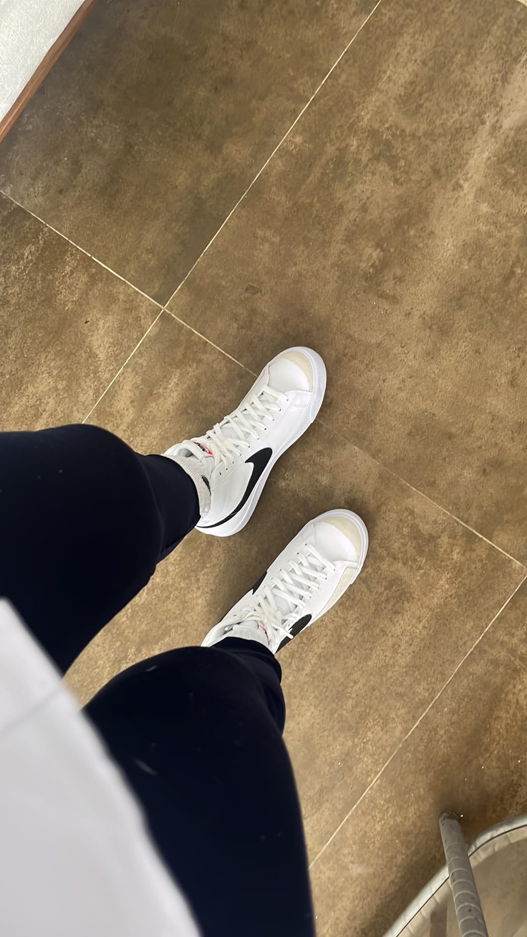 Nike Kids Blazer Mid 77 lifestyle shot showing versatility for daily wear and various activities