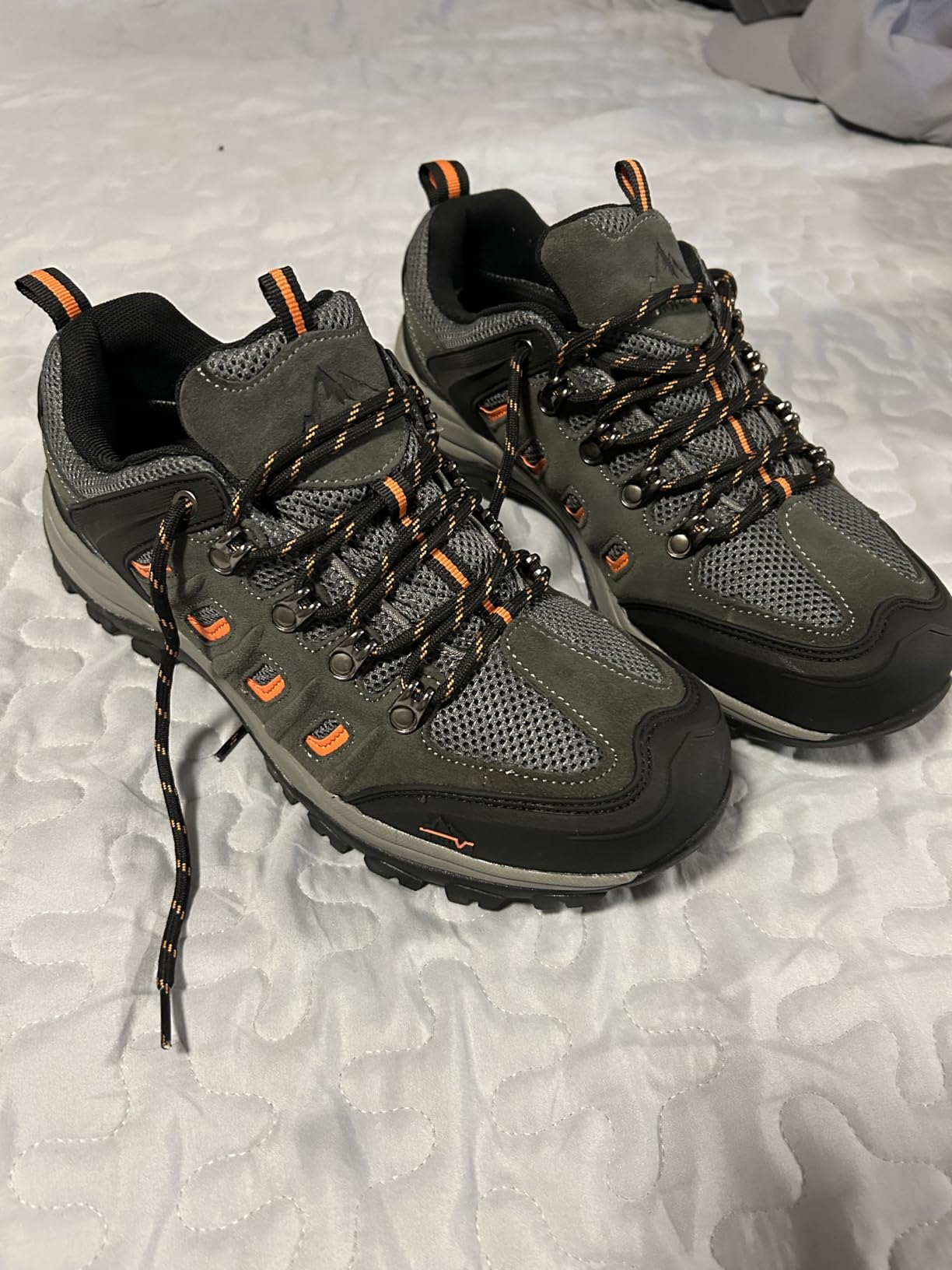 NORTIV 8 hiking shoes in action on rocky trail surface showing real-world durability and traction performance