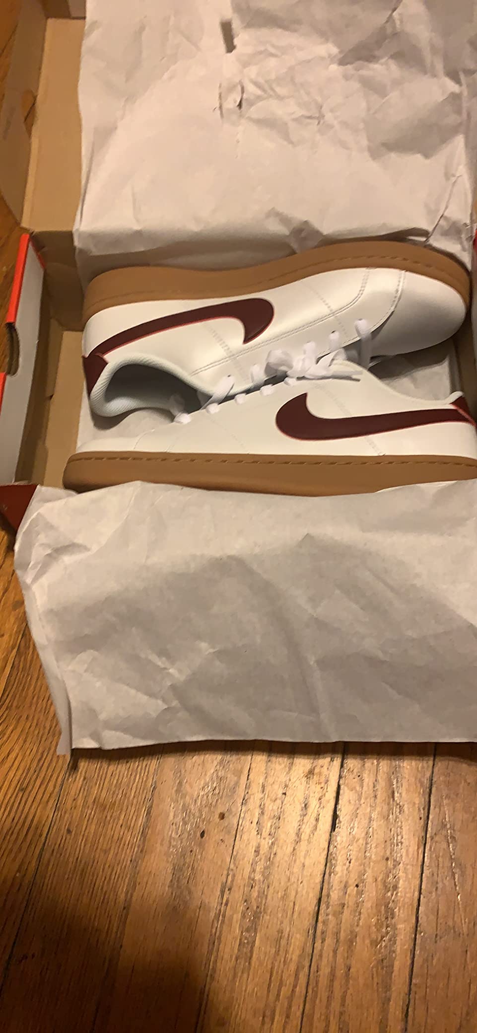 Nike tennis shoe upper construction showing synthetic leather materials and retro basketball design elements
