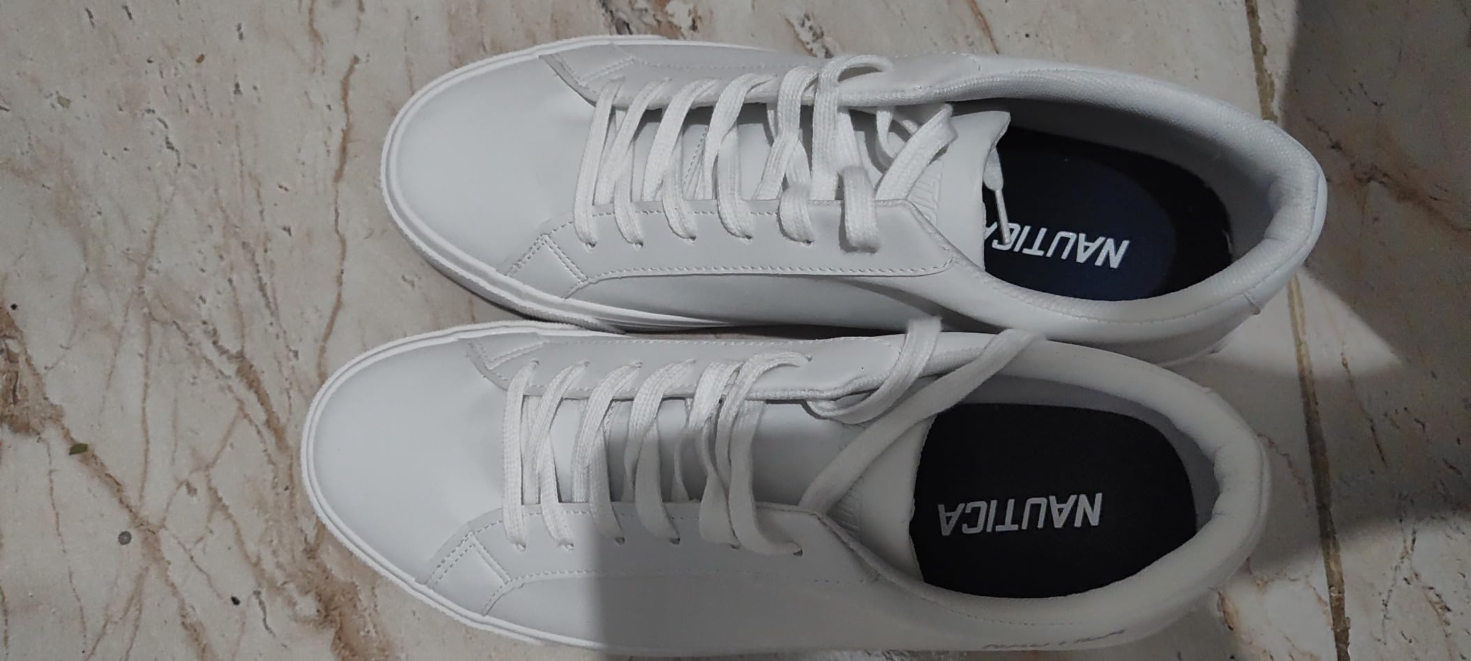 Overall view of Nautica casual shoes showing complete design and styling from multiple angles