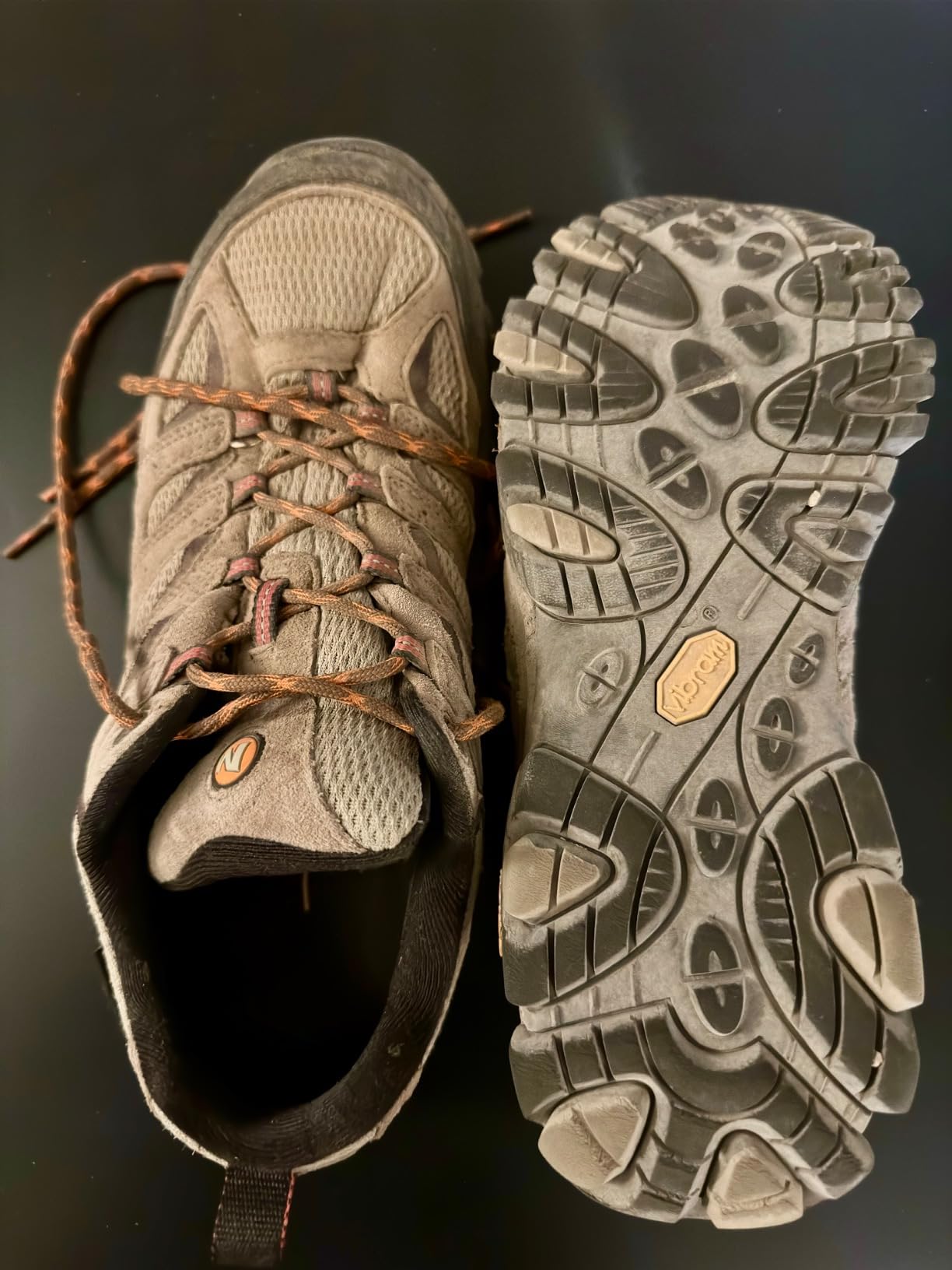 Close-up view of Merrell Moab 3 upper construction showing suede and mesh materials with lacing system