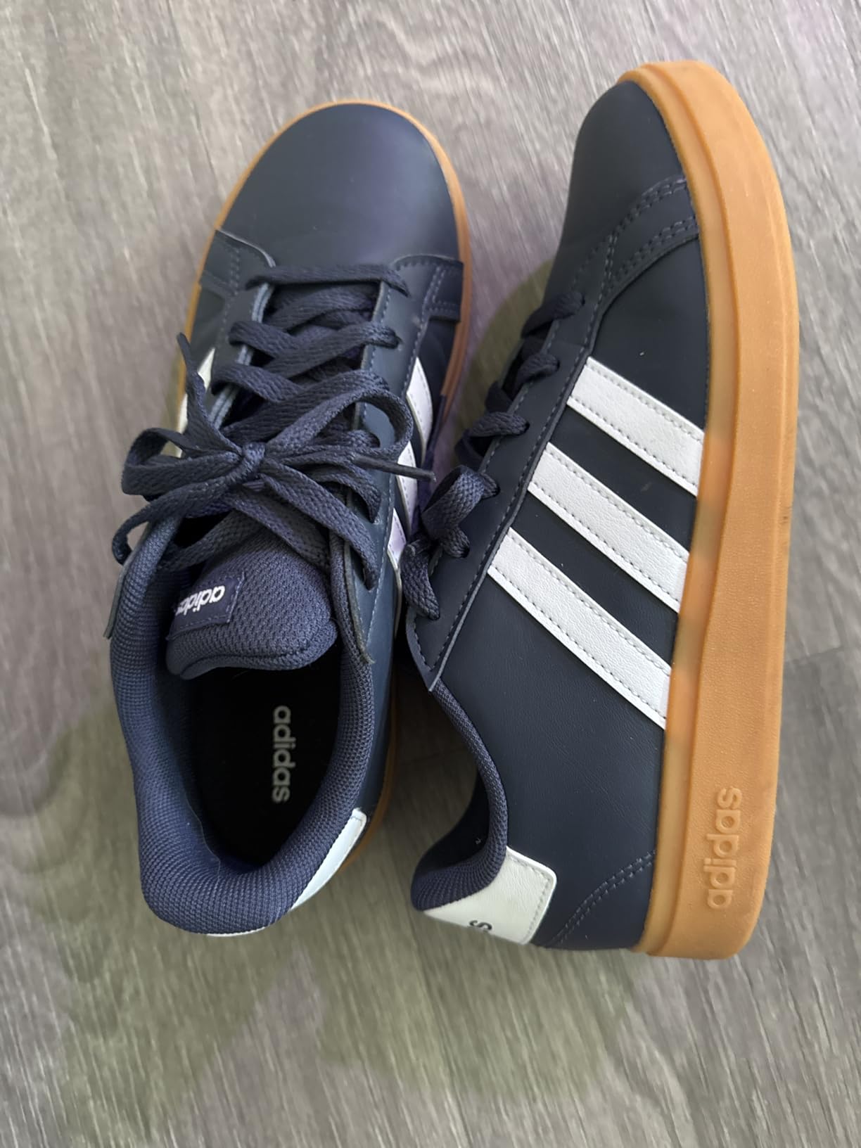 Comparison showing Adidas Grand Court 2.0 construction quality and brand promise verification